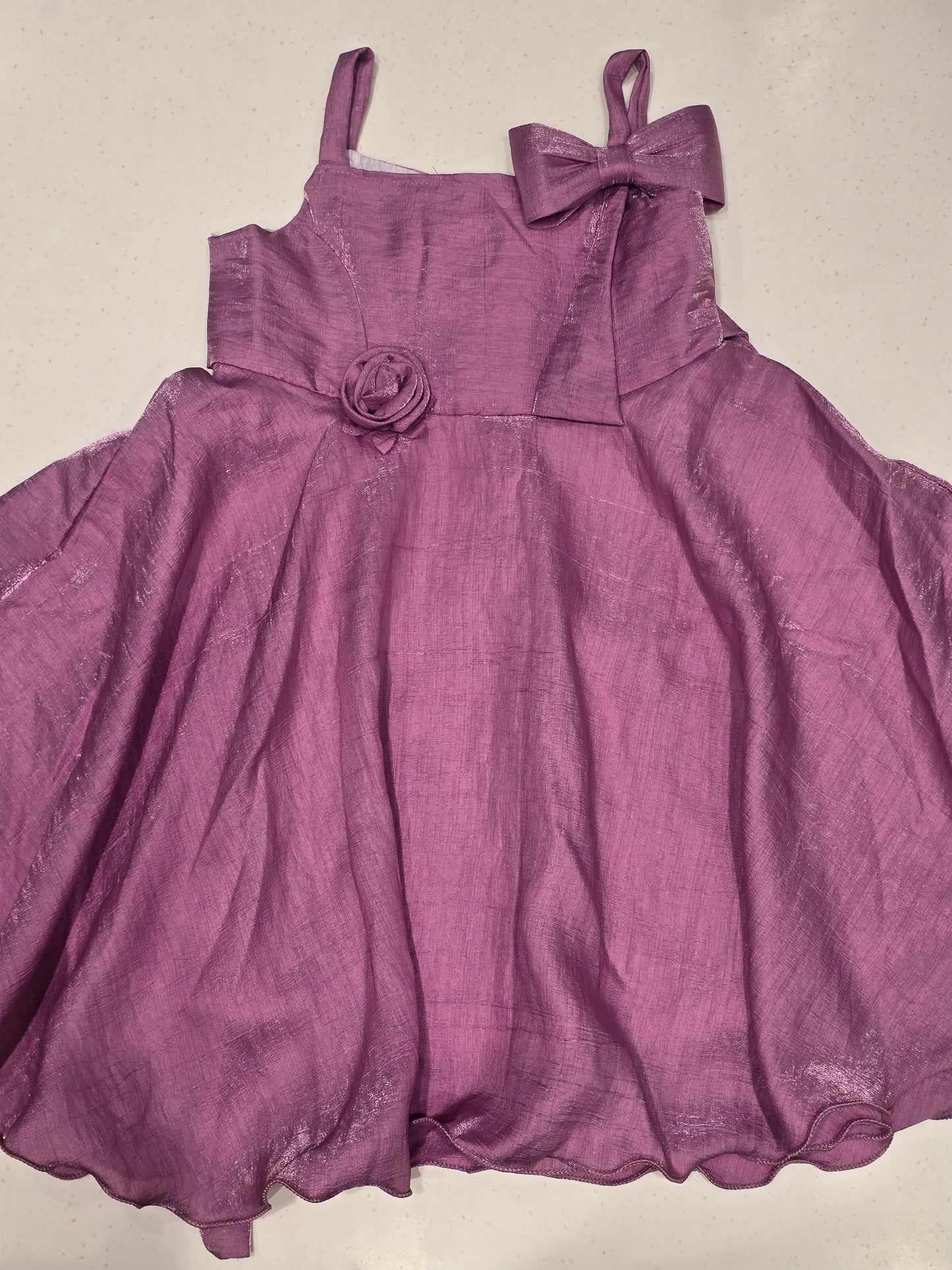 Shimmer material onion oink color baby frock with designer bow