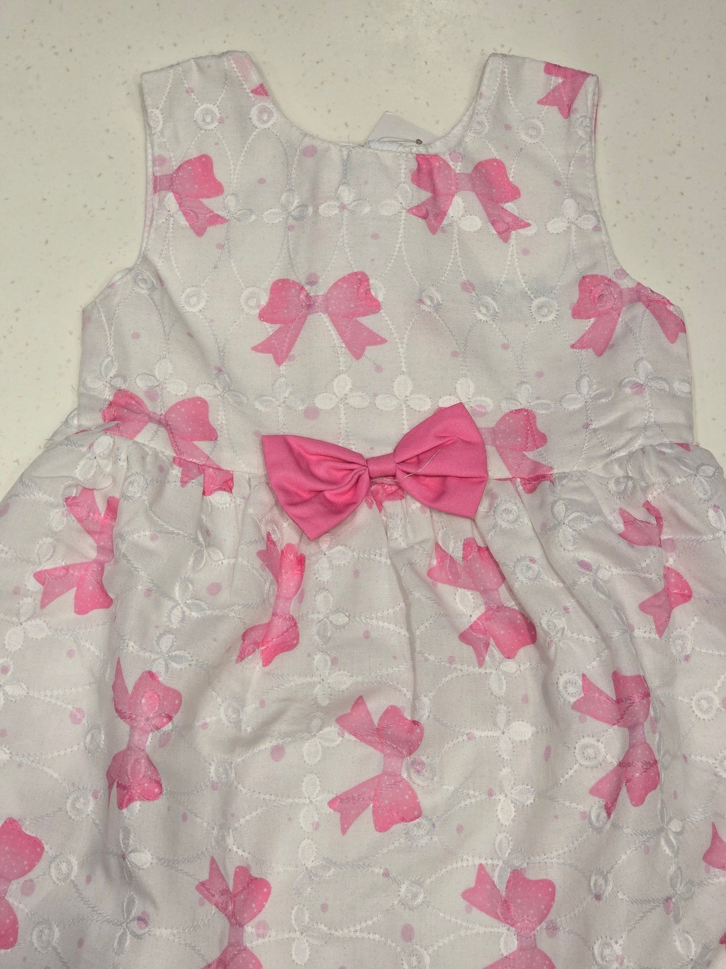 Cotton material white color with pink printed bow Baby frock