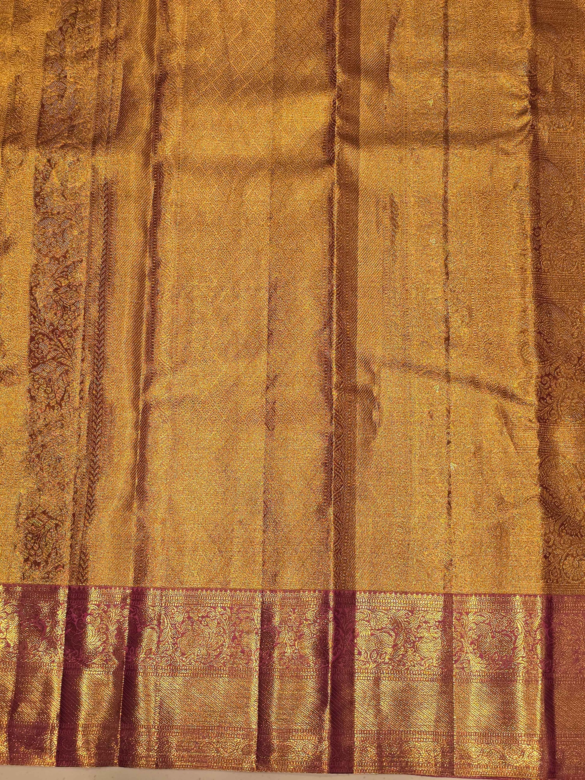 Pure handloom kanjivaram tissue silk baby pink base saree with contrast blouse and rich pallu , long traditional gatti border