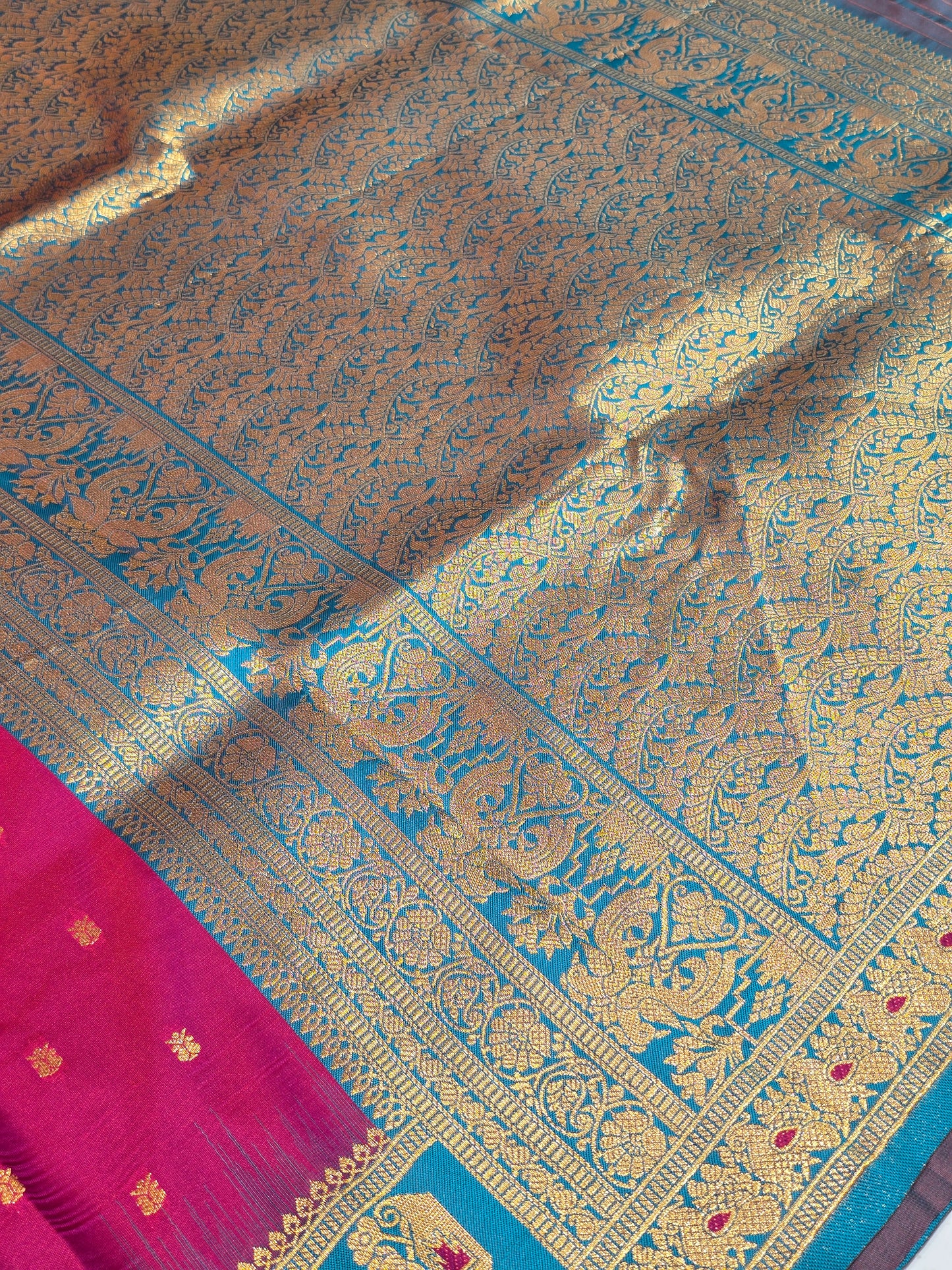 Semi soft silk with butta across the body rich pallu , traditional border