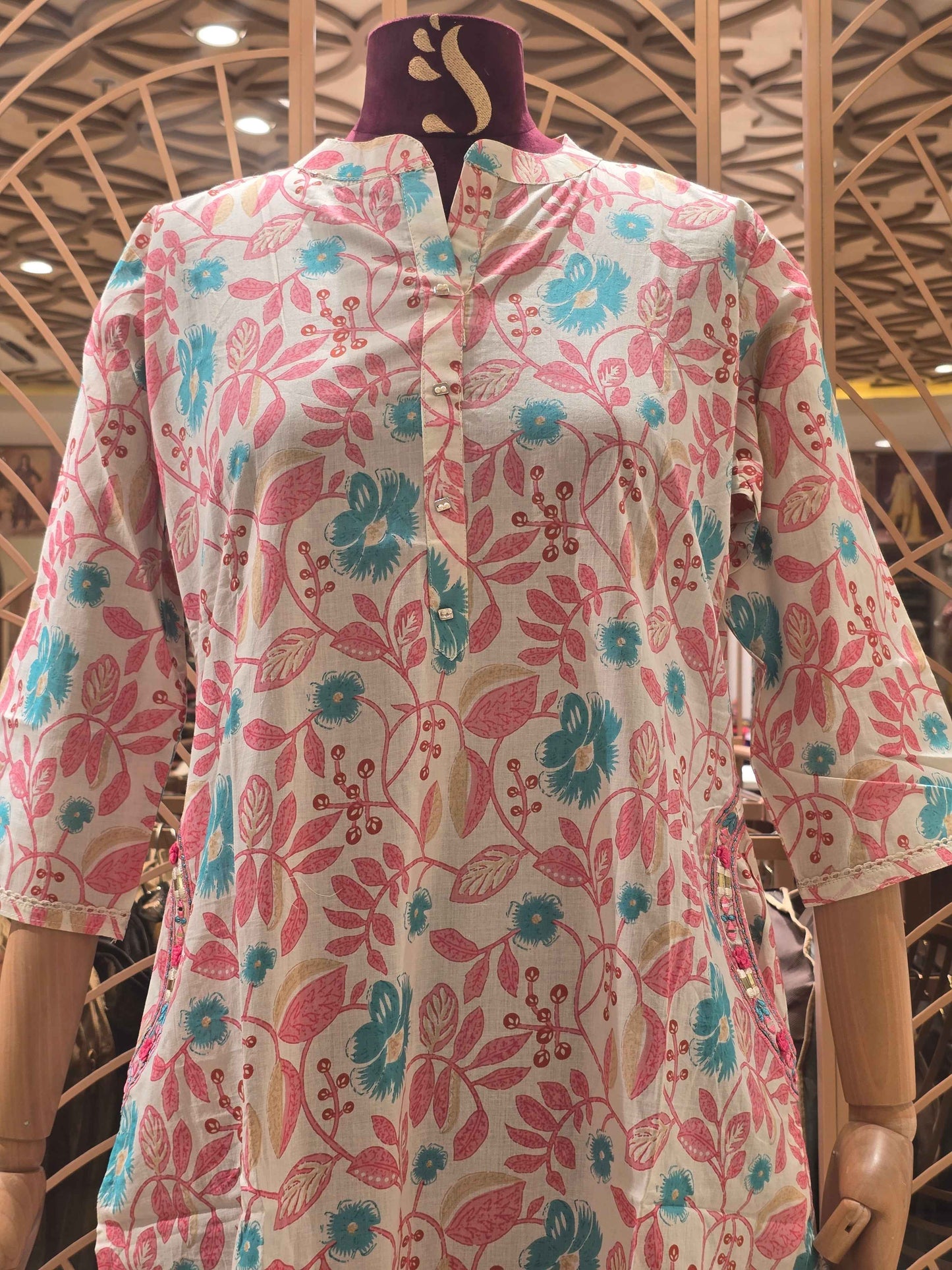 Printed Cotton material half white based with colar neck and pocket