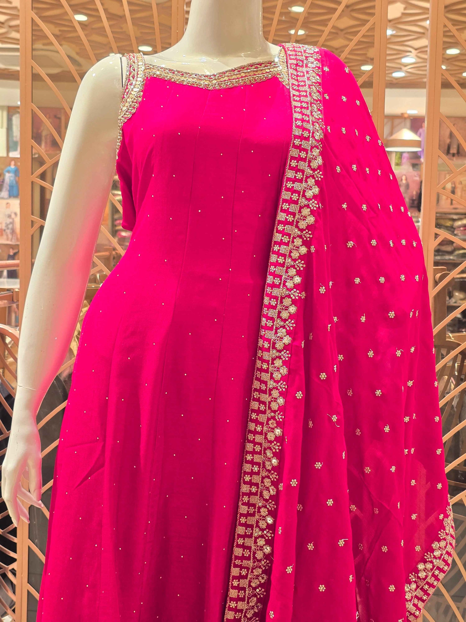 Semi silk material Rani pink colour anarkali set with speghetti neck