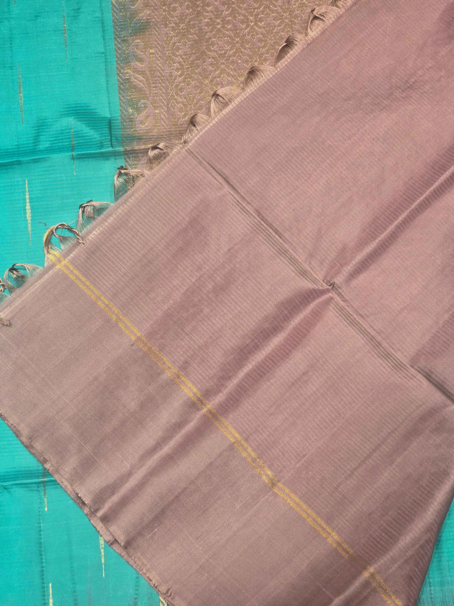 Pure softsilk saree with rain drops motifs over the body