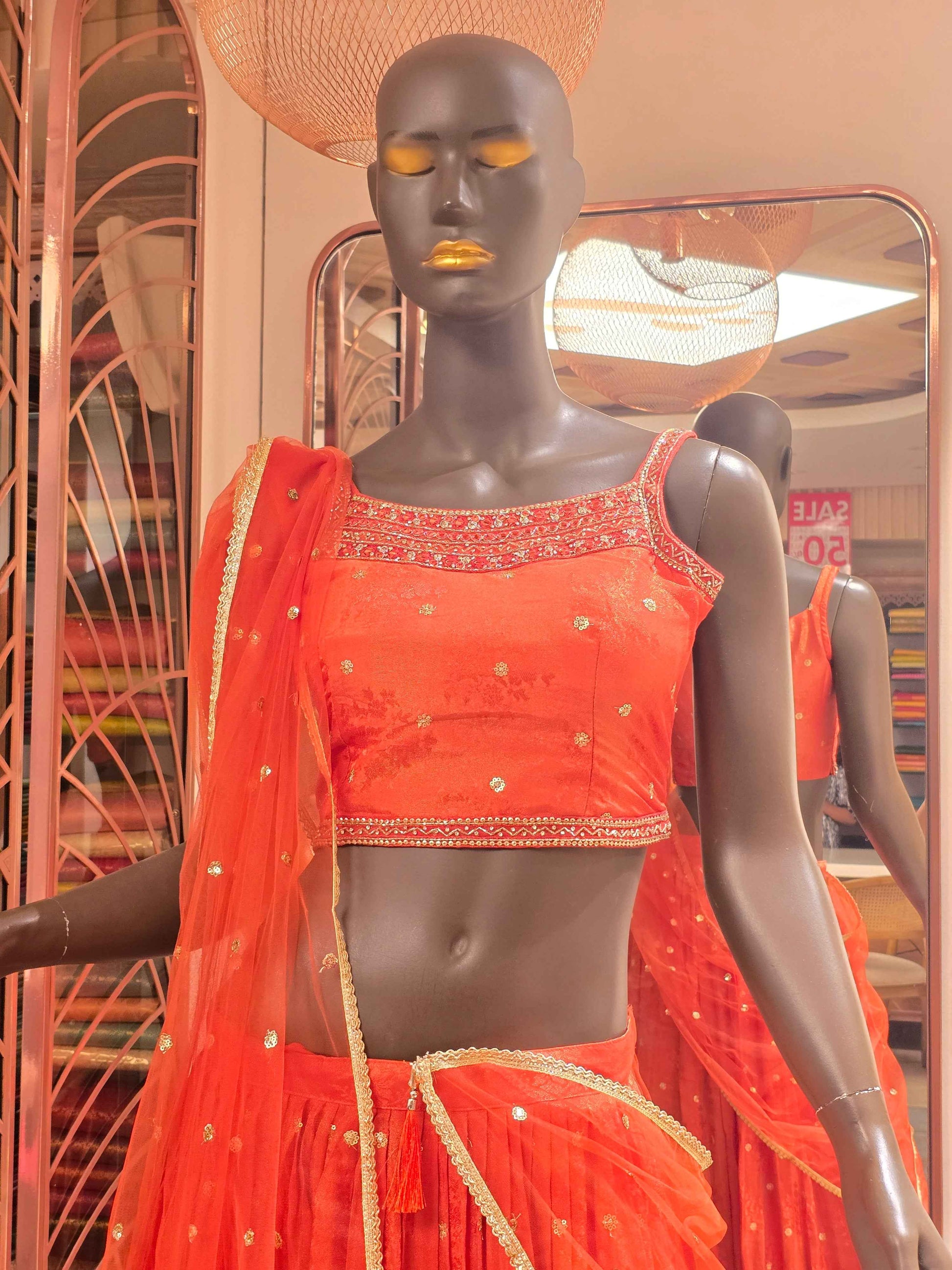 Tissue silk material lehenga for women with zari work border and motifs