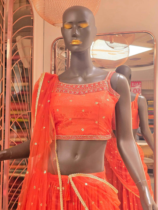 Tissue silk material lehenga for women with zari work border and motifs