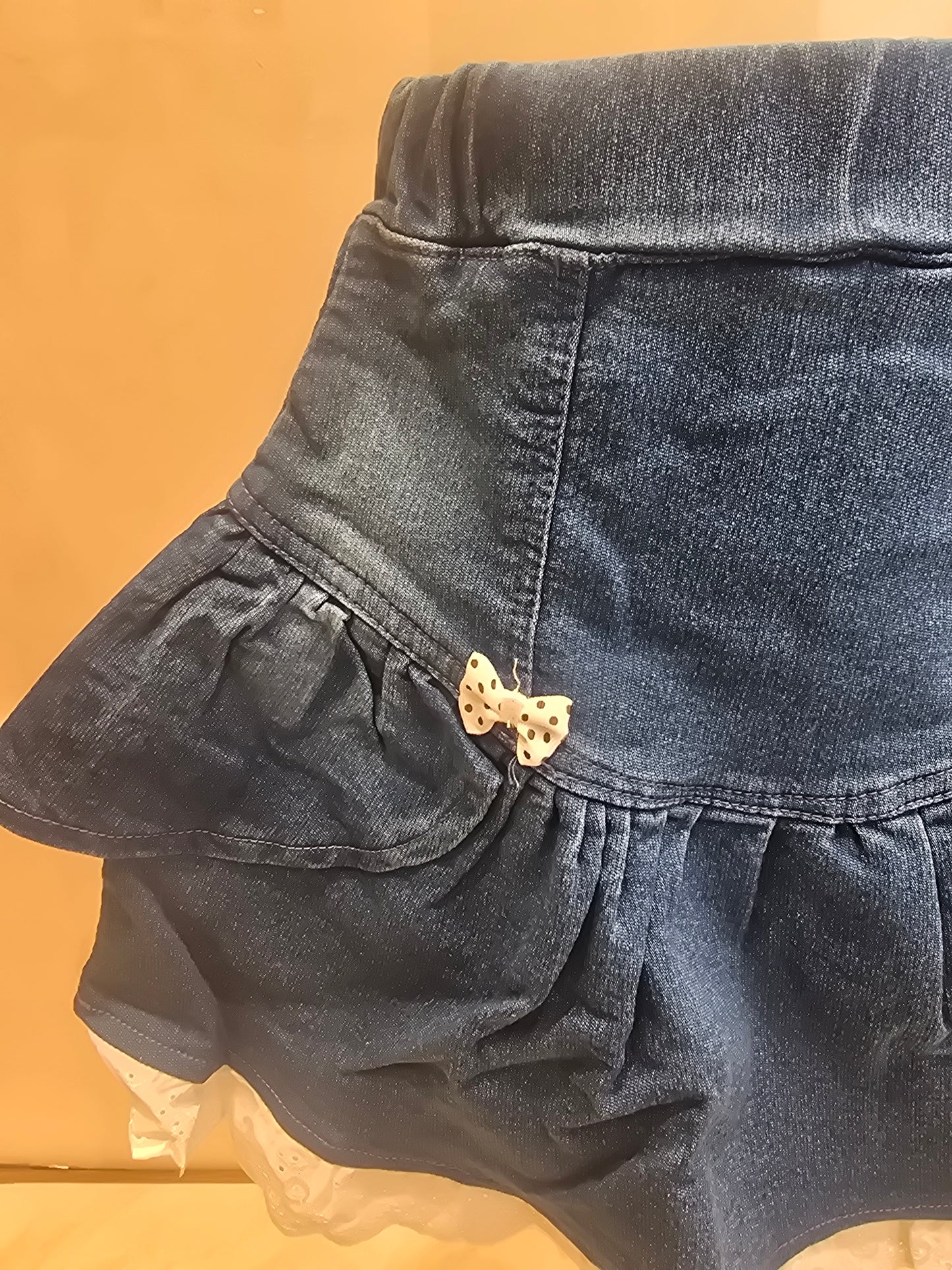 Blue Denim Skirt for Girls with Side Bow Details, White Knitted Lace Design and Elastic Waistband for Casual Wear