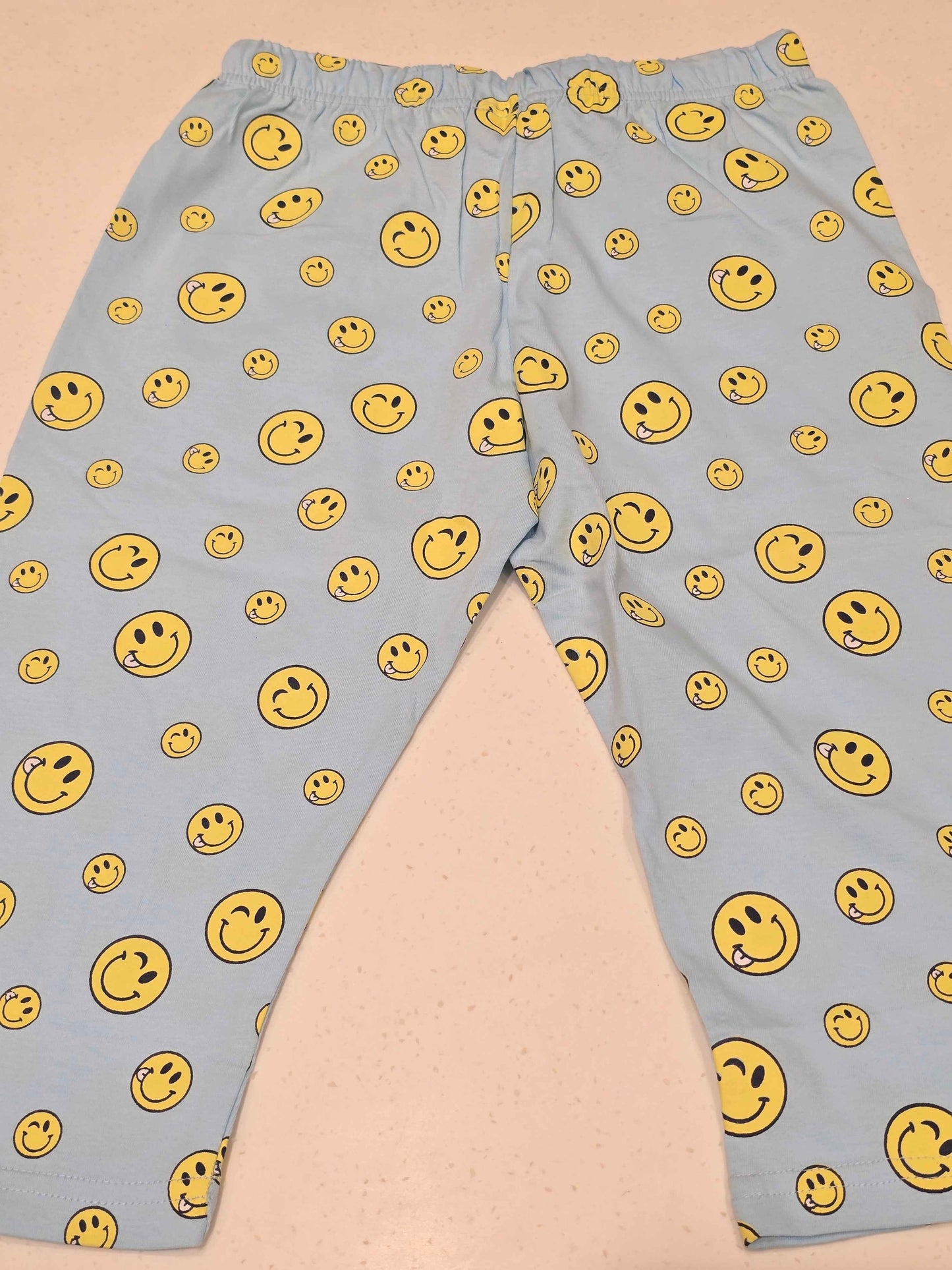 Printed Cotton material sky blue colour capri with smily face