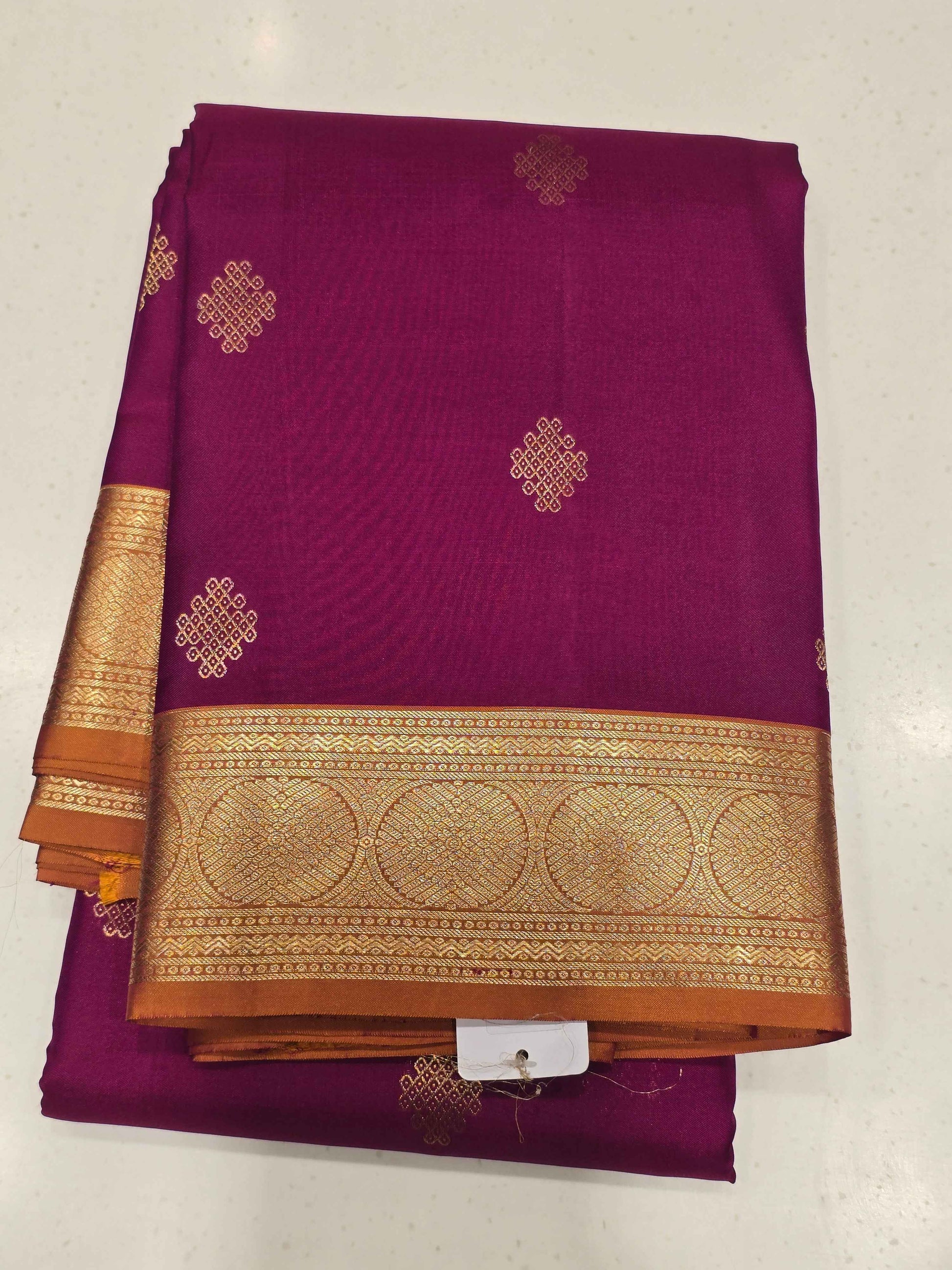 Pure Kanjivaram silk Magenta color saree with kolam butta