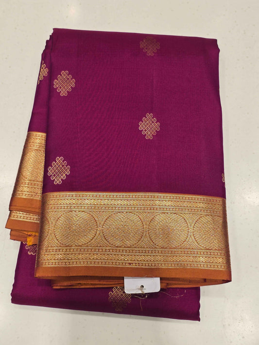 Pure Kanjivaram silk Magenta color saree with kolam butta