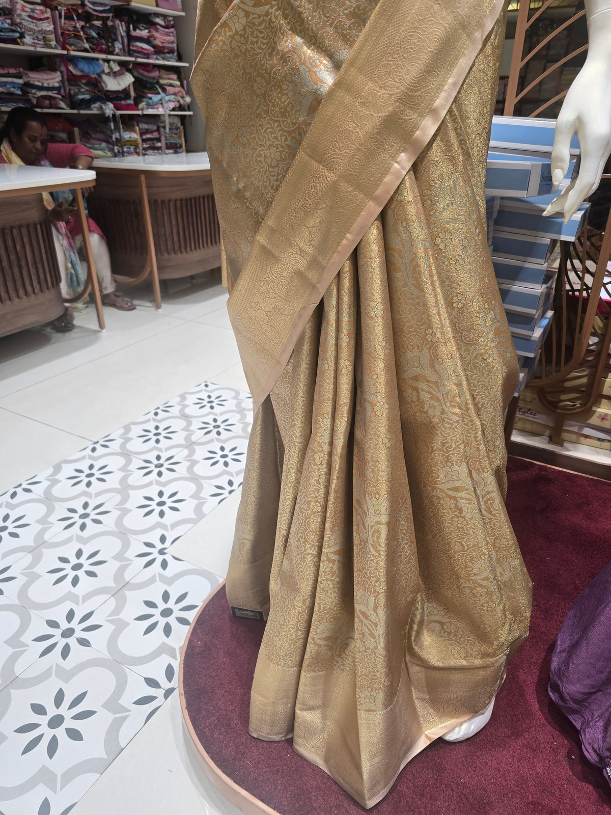 golden-toned semi silk saree.