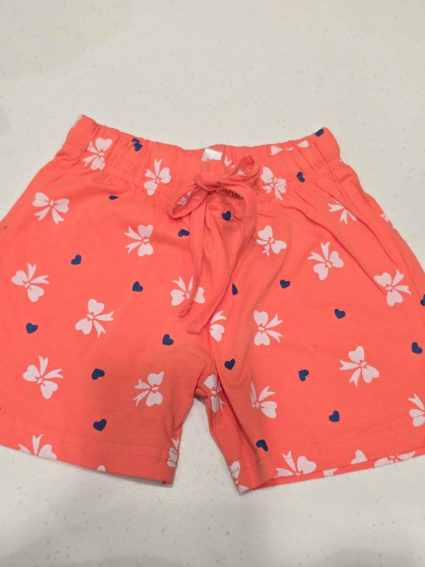 Printed Cotton material orange color shorts for girl