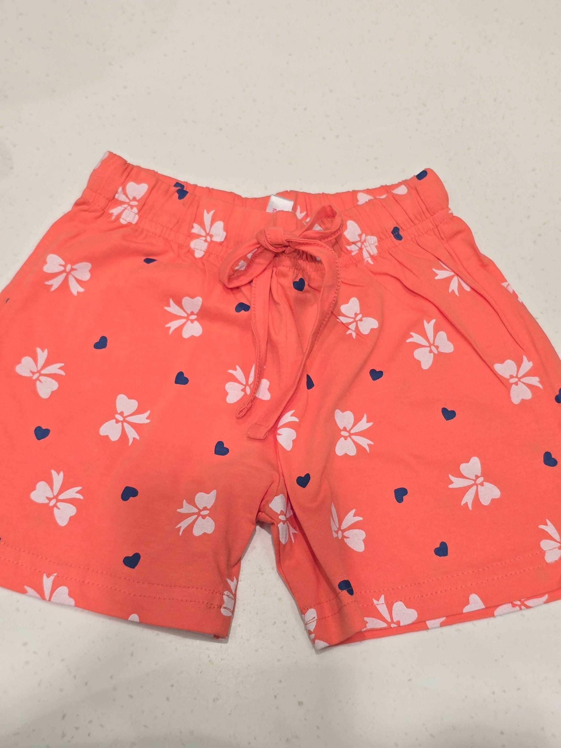 Printed Cotton material orange color shorts for girl