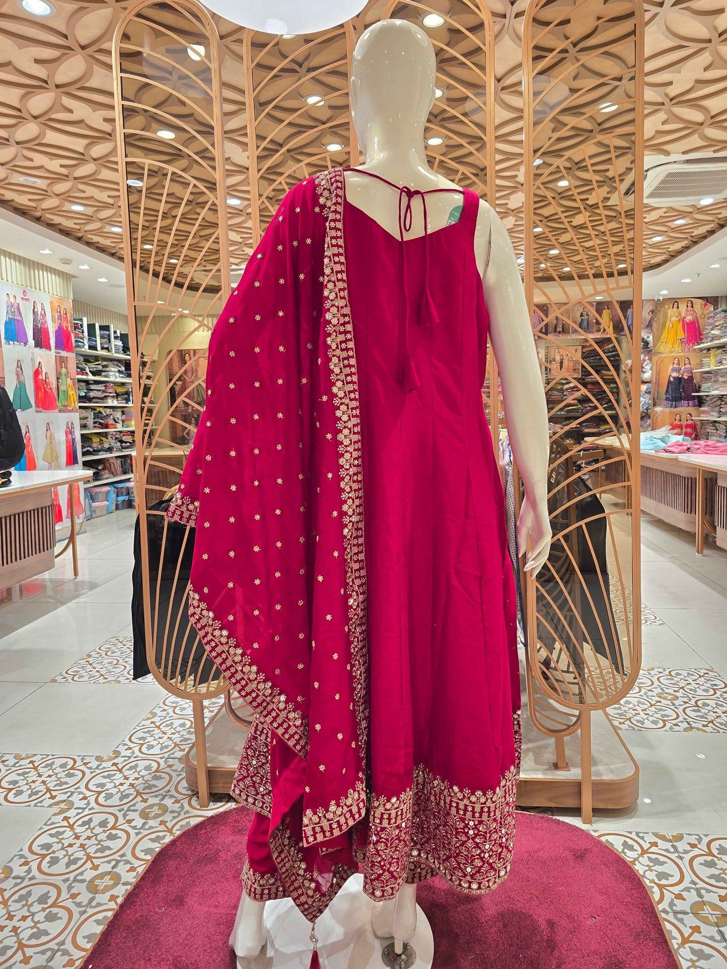 Semi silk material Rani pink colour anarkali set with speghetti neck