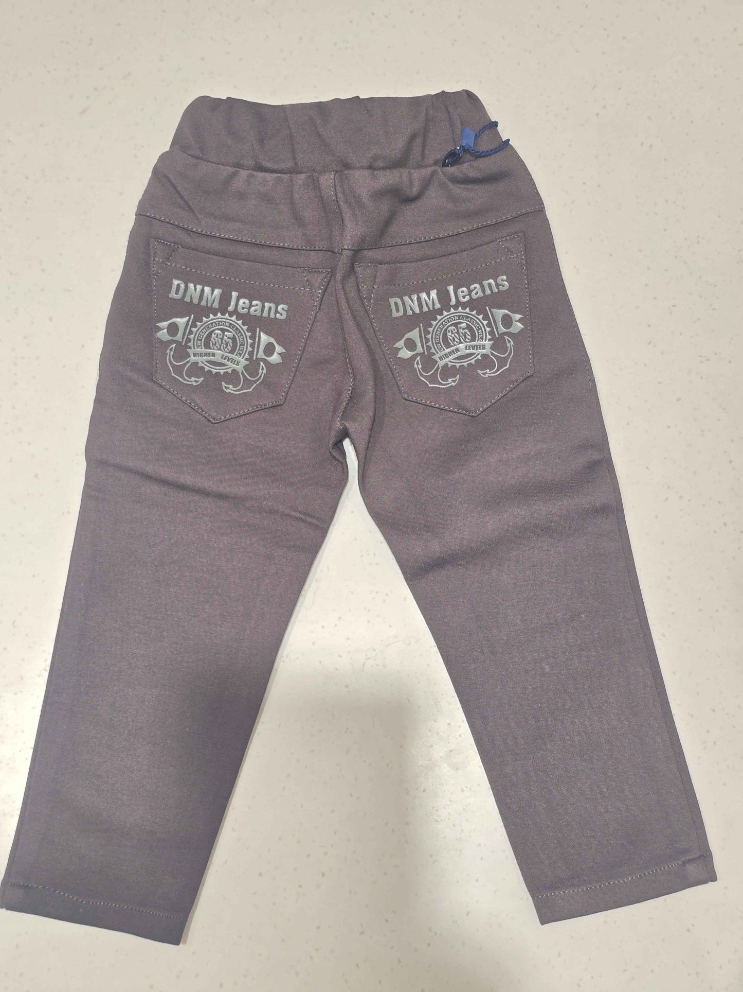 Stretchable material dark brwon colour pant for boy with round Elasticable