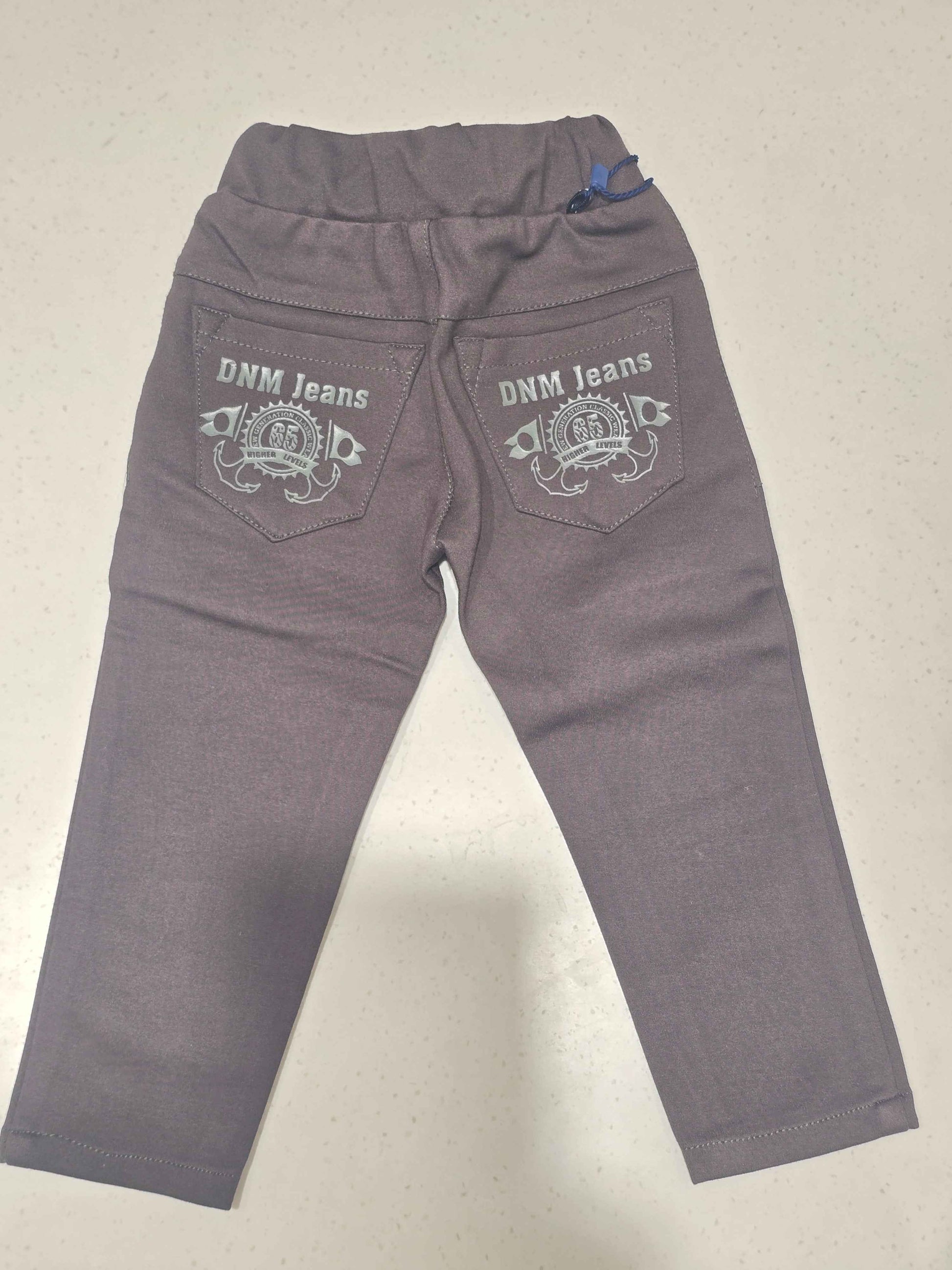 Stretchable material dark brwon colour pant for boy with round Elasticable