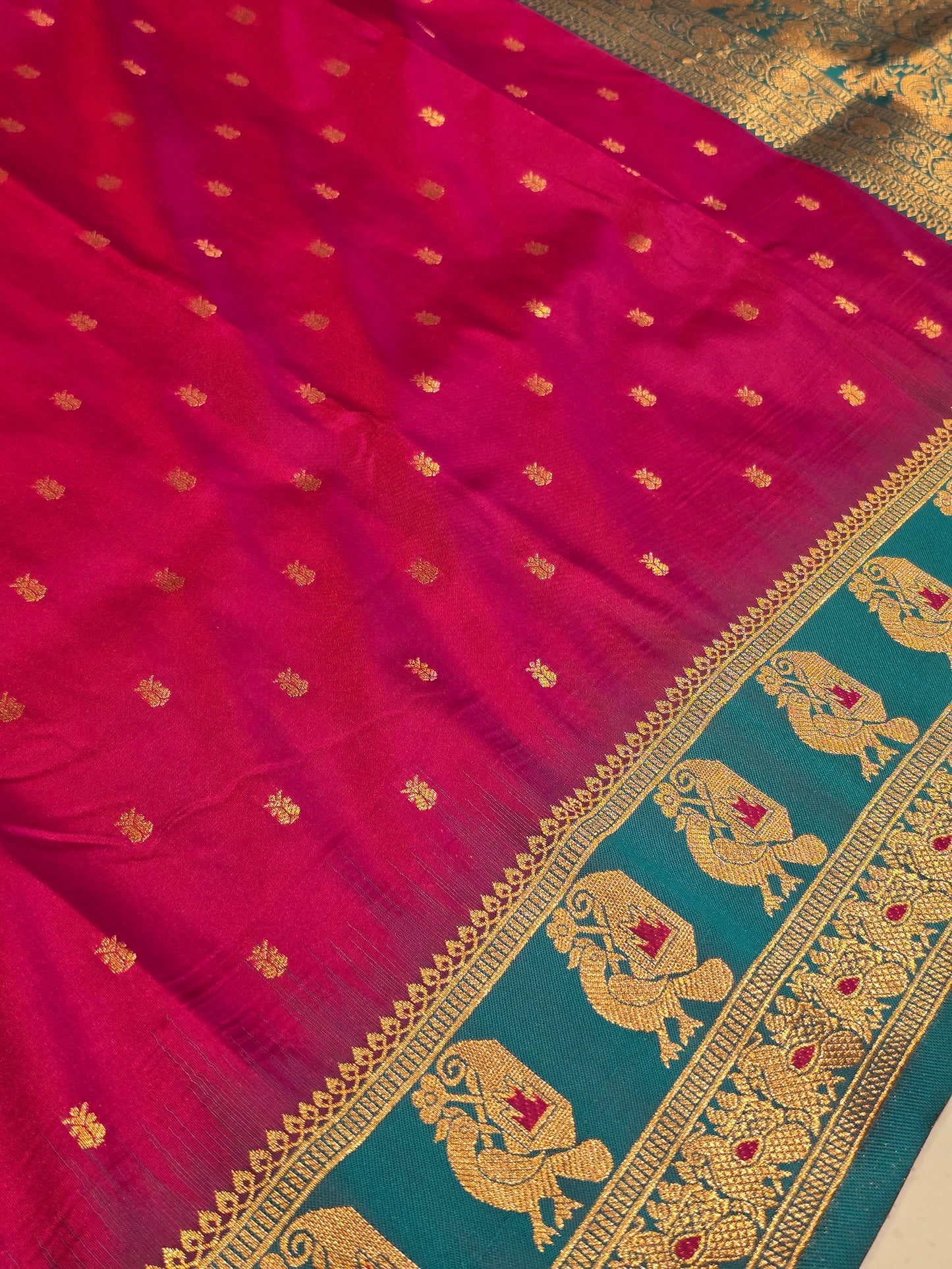 Semi soft silk with butta across the body rich pallu , traditional border
