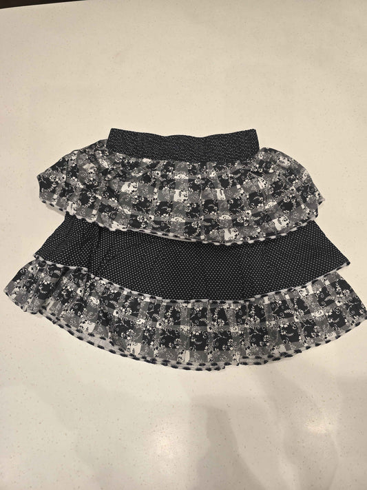 black and white mixed-pattern tiered ruffle mini skirt