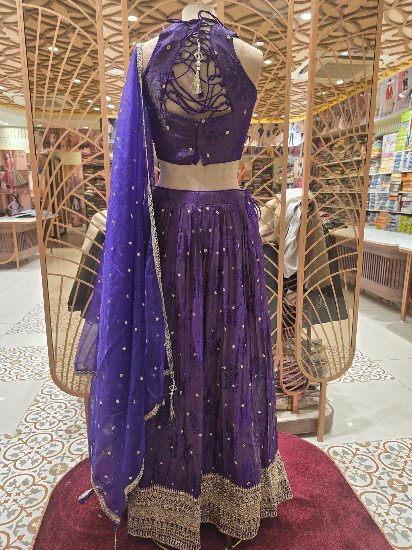 Purple Net Lehenga with Tissue Butta Motifs & Sequence–Zari Work | V-Neck Blouse & Tissue Dupatta