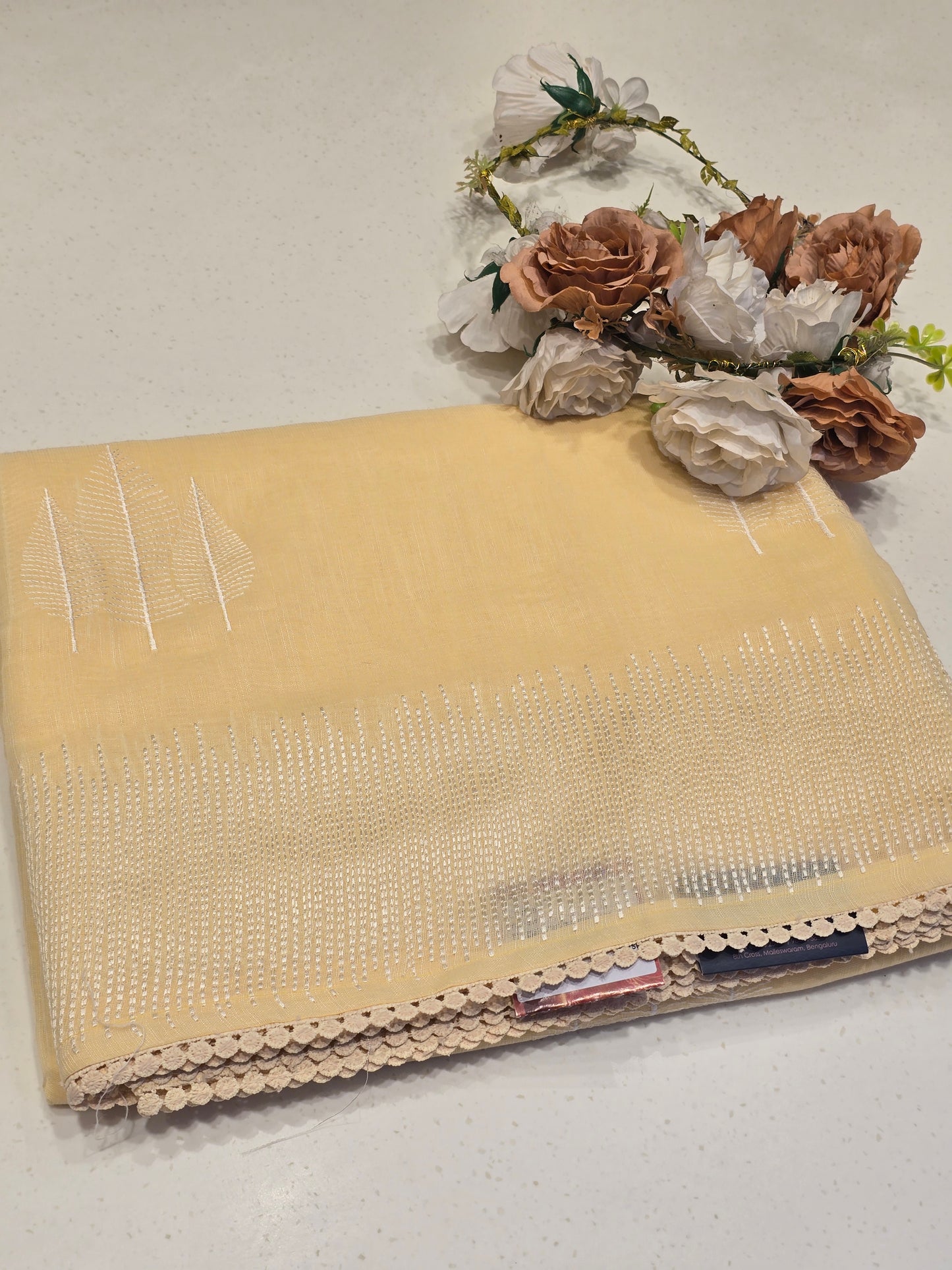 Linen with embroidery border and leaf motif Normal wear