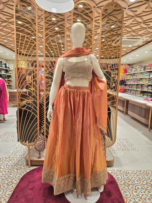 Tissue Material dual shade lehenga with handwork on top and speghetti