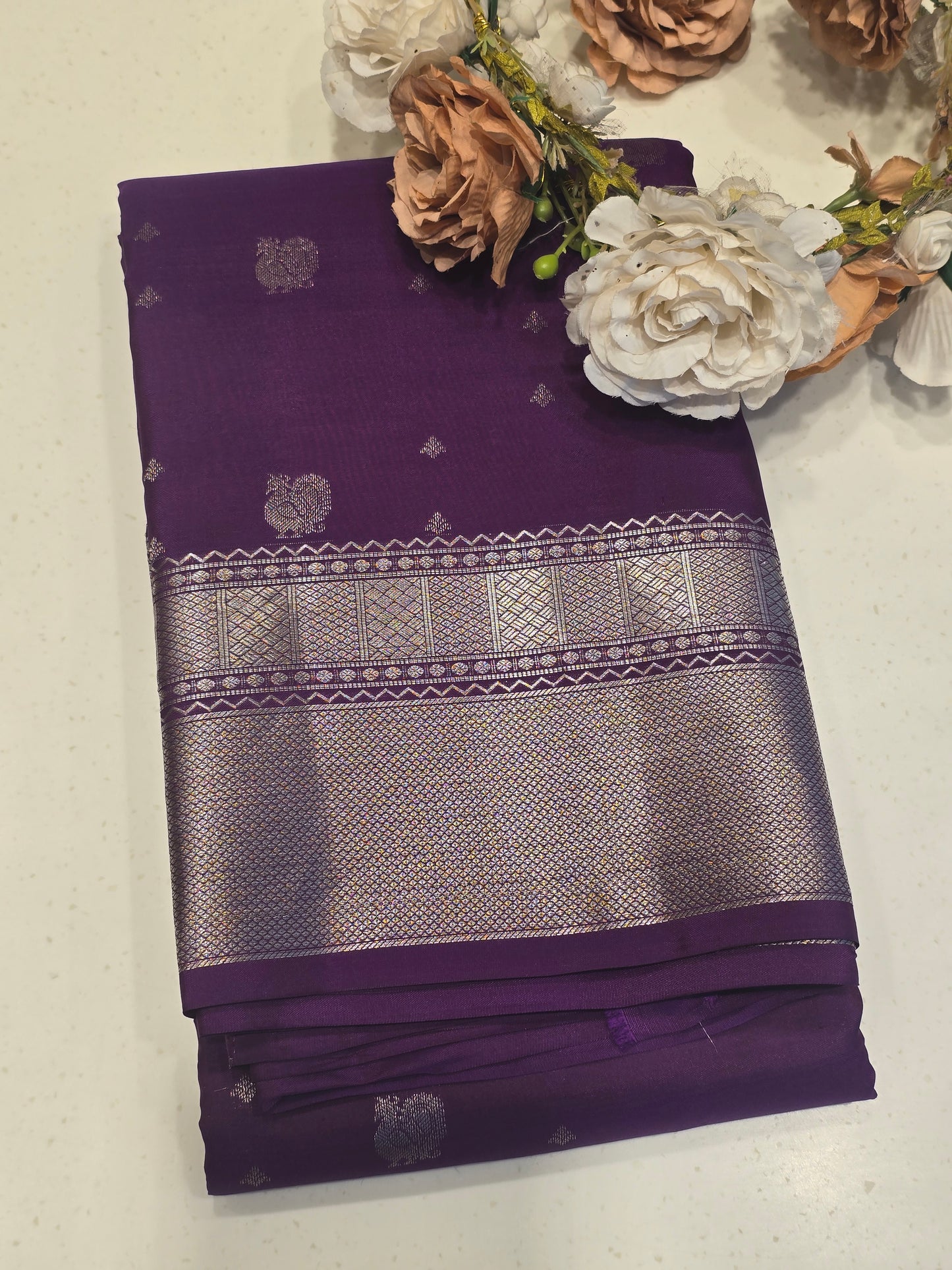 Women Purple Pure Kanjivaram Silk Saree with Silver Rudrakshi Motifs