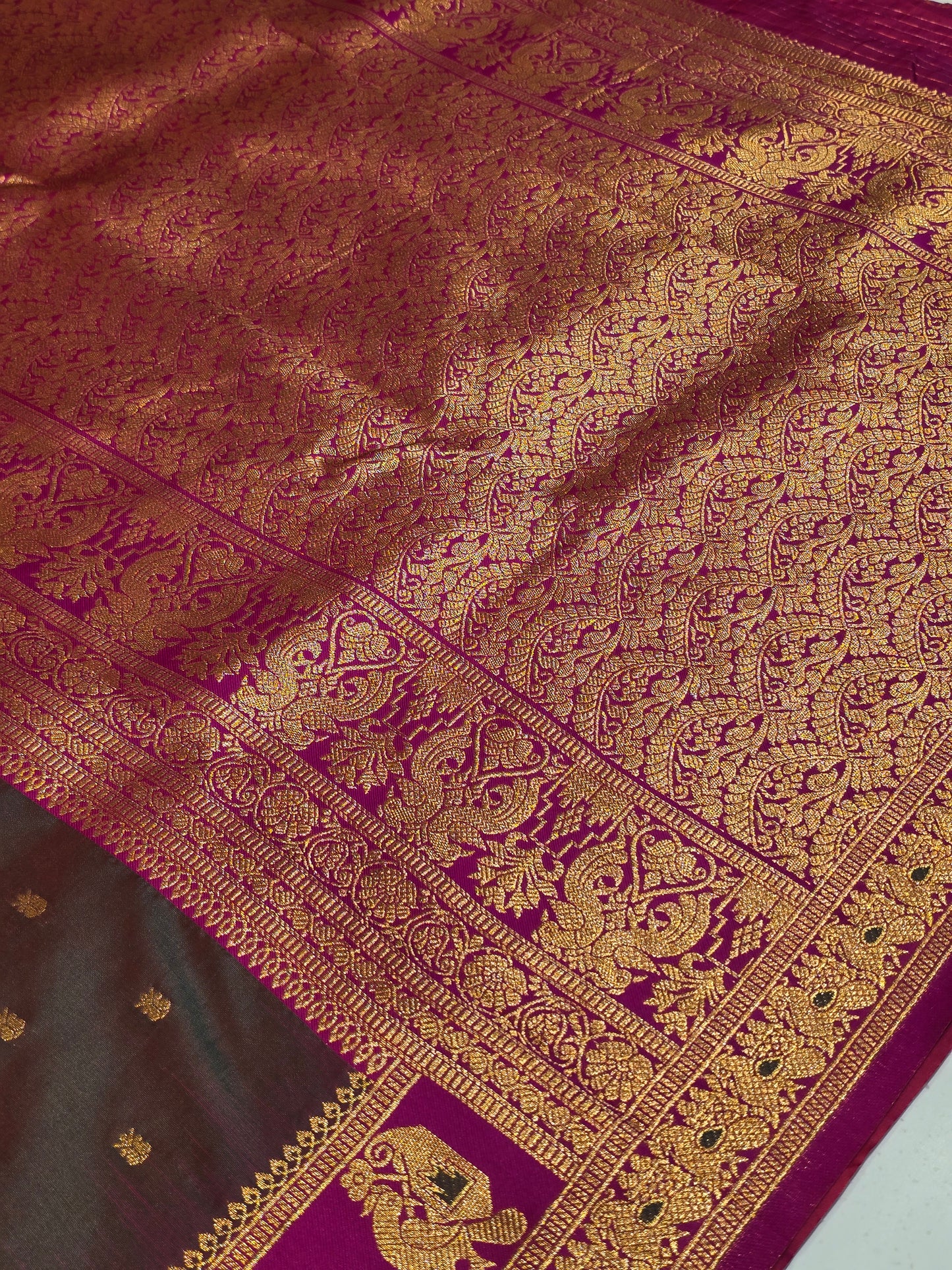 Semi soft silk with butta across the body rich pallu , traditional border