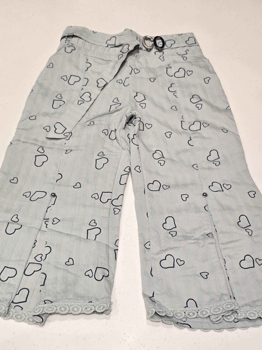 A pair of light gray patterned trousers featuring an all-over heart print,