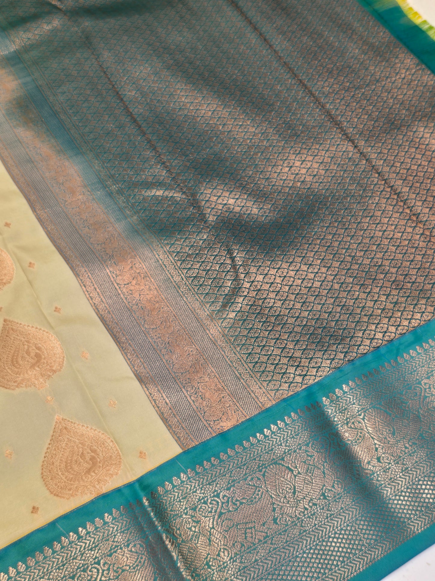 Semi Kanjivaram muhurtham saree with leaf styled vertical motifs & small butta with rich pallu , traditional border
