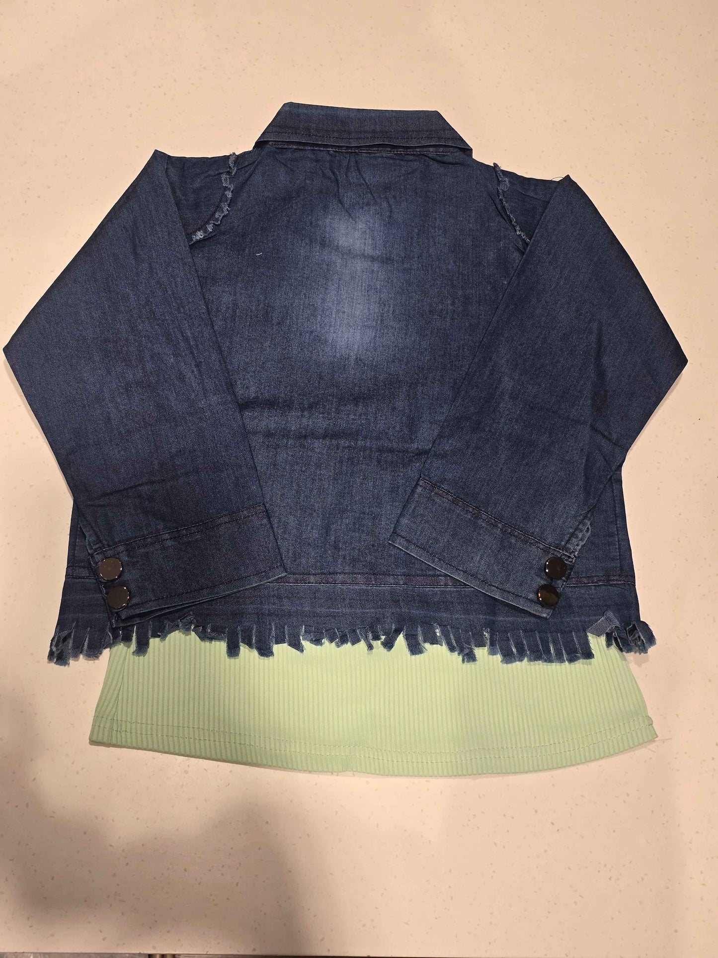kids' tiered frill dress featuring alternating horizontal layers of patterned fabric.