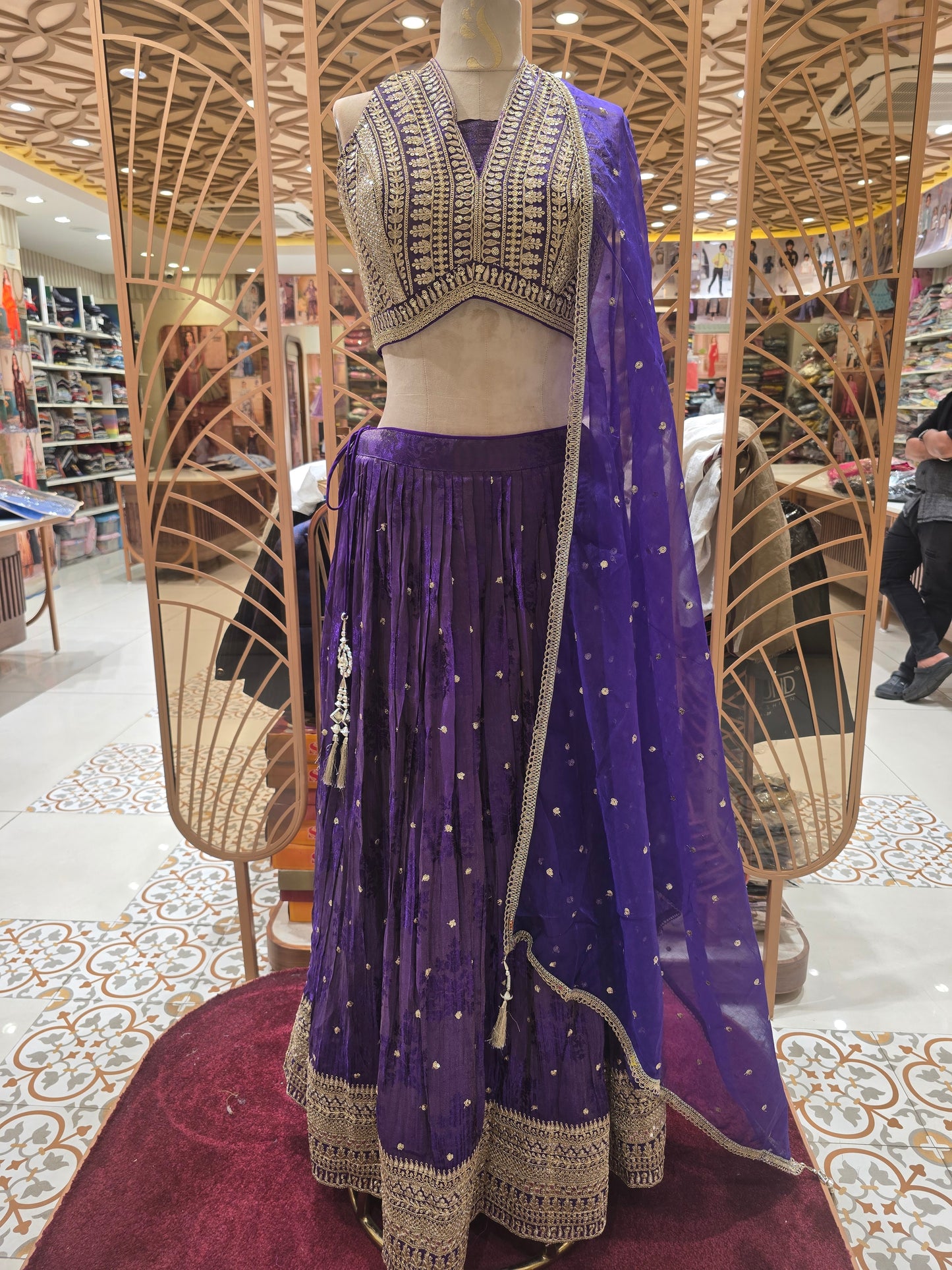 Purple Net Lehenga with Tissue Butta Motifs & Sequence–Zari Work | V-Neck Blouse & Tissue Dupatta