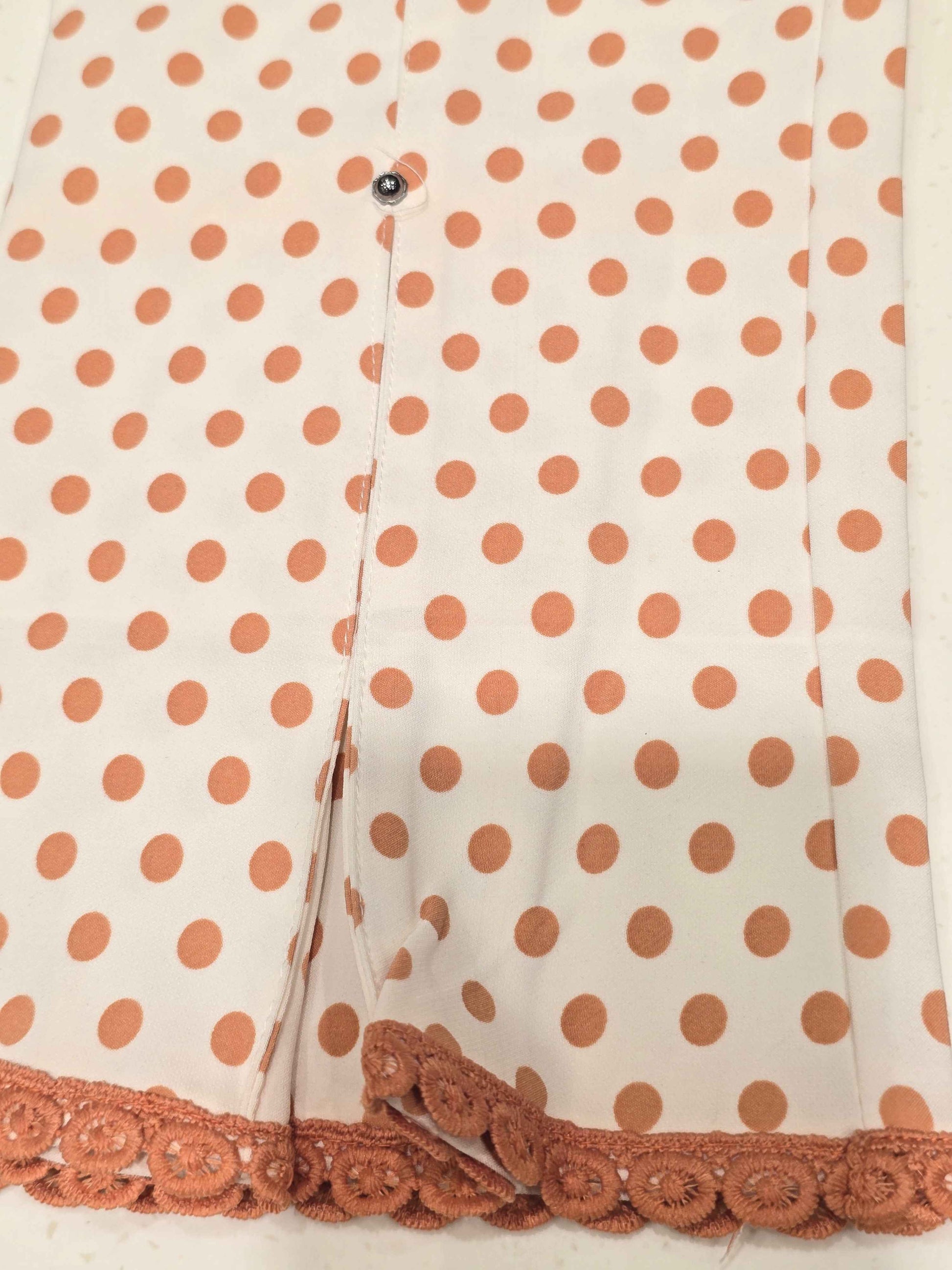 Printed Cotton material white based with polka dots