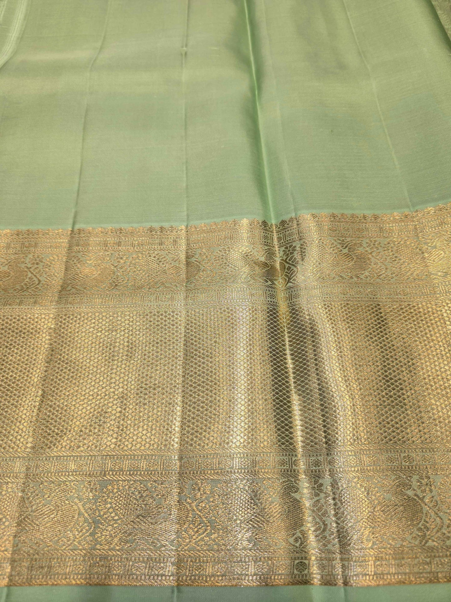 Handloom pure kanjivaram brocade silk self saree , with long gatti traditional border and rich pallu