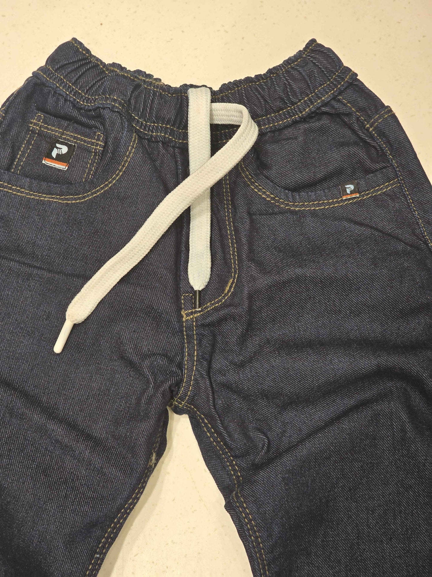 Denim material dark blue color jeans pant for boy with round elasticable