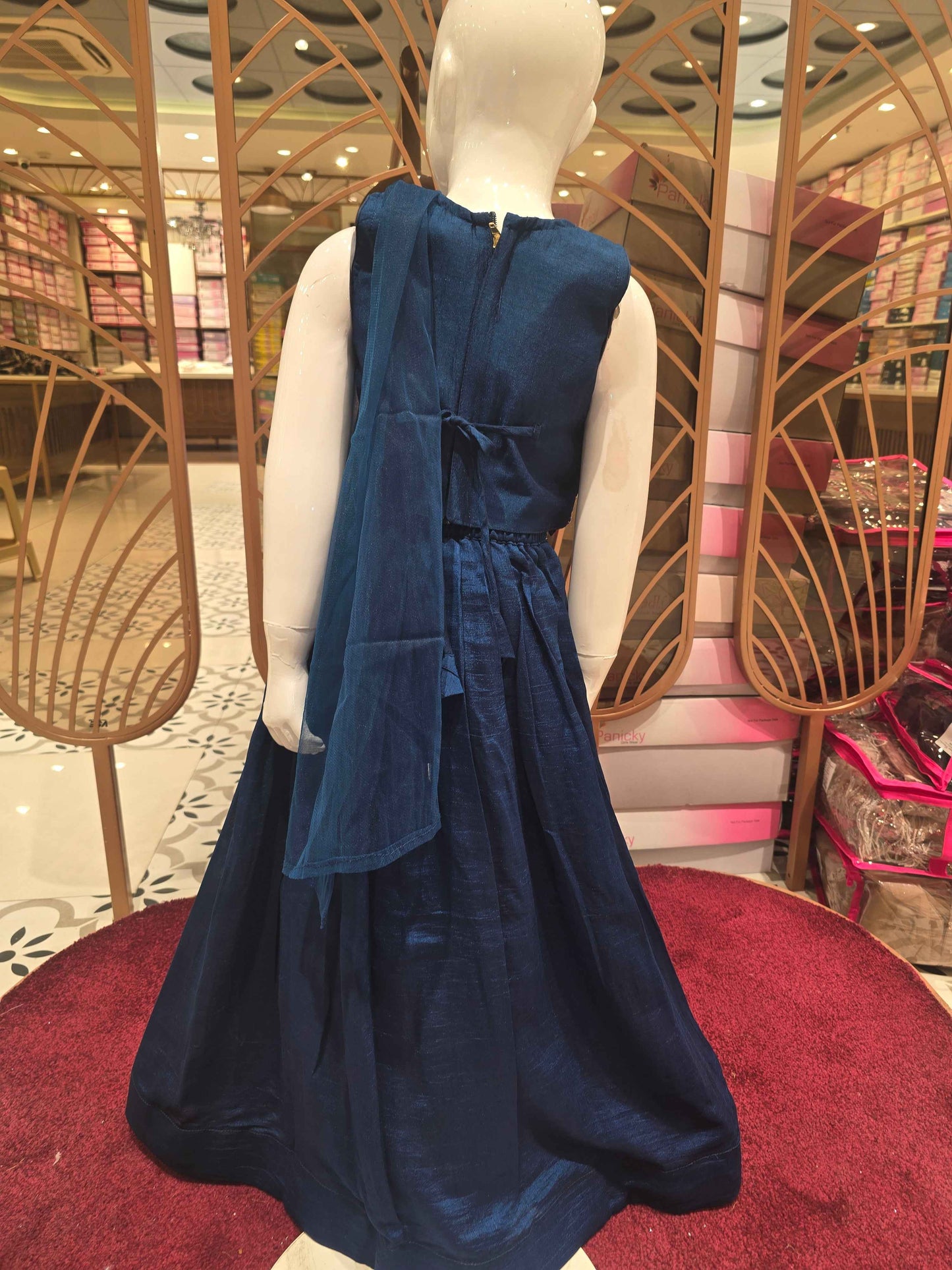 Chinon material Teel blue colour gaghra choli with zari embroidery on v styled neck. Small zari buta and traditional border