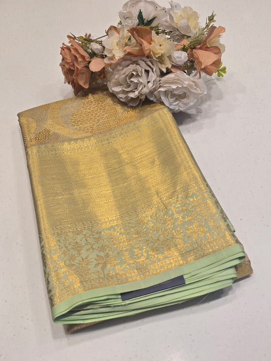 Exclusive Handloom Pure Tissue Silk Saree with Fancy Design, Long Border & Rich Zari Pallu – Premium Wedding Wear