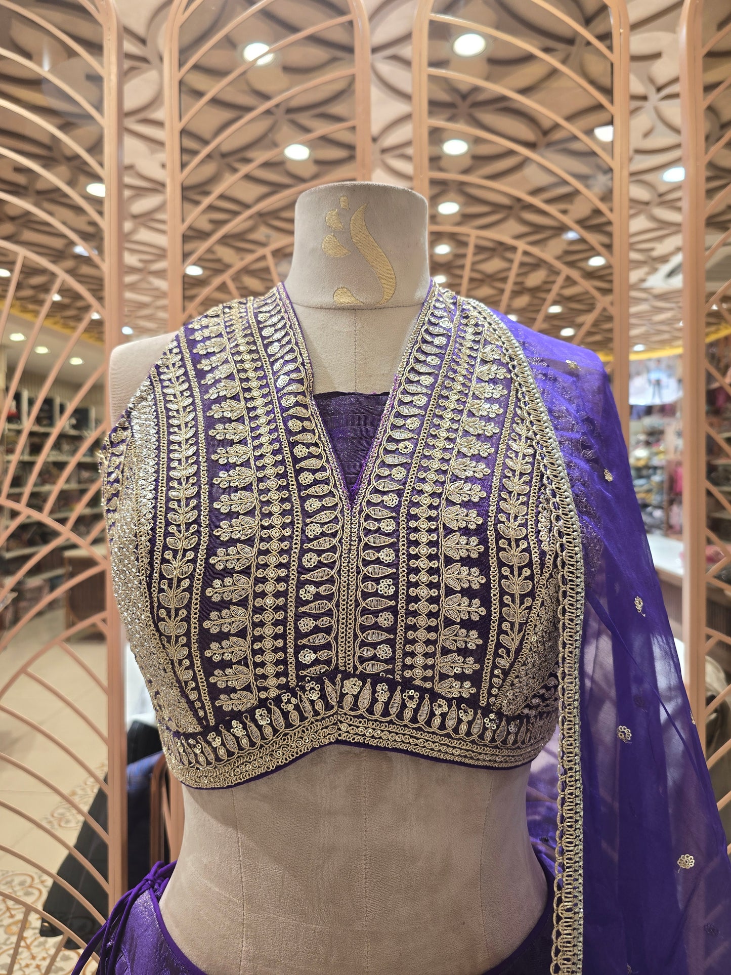 Purple Net Lehenga with Tissue Butta Motifs & Sequence–Zari Work | V-Neck Blouse & Tissue Dupatta