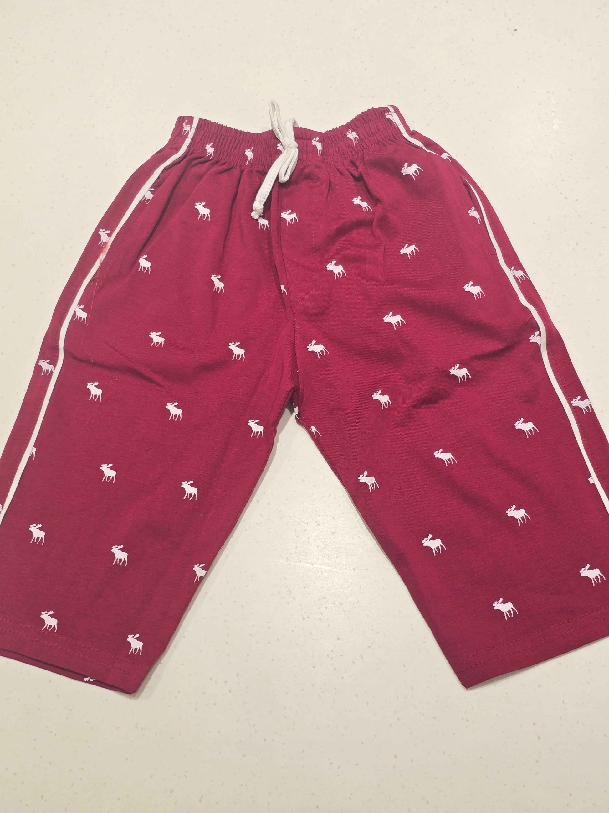 Cotton material marron color ¾ shorts with white design