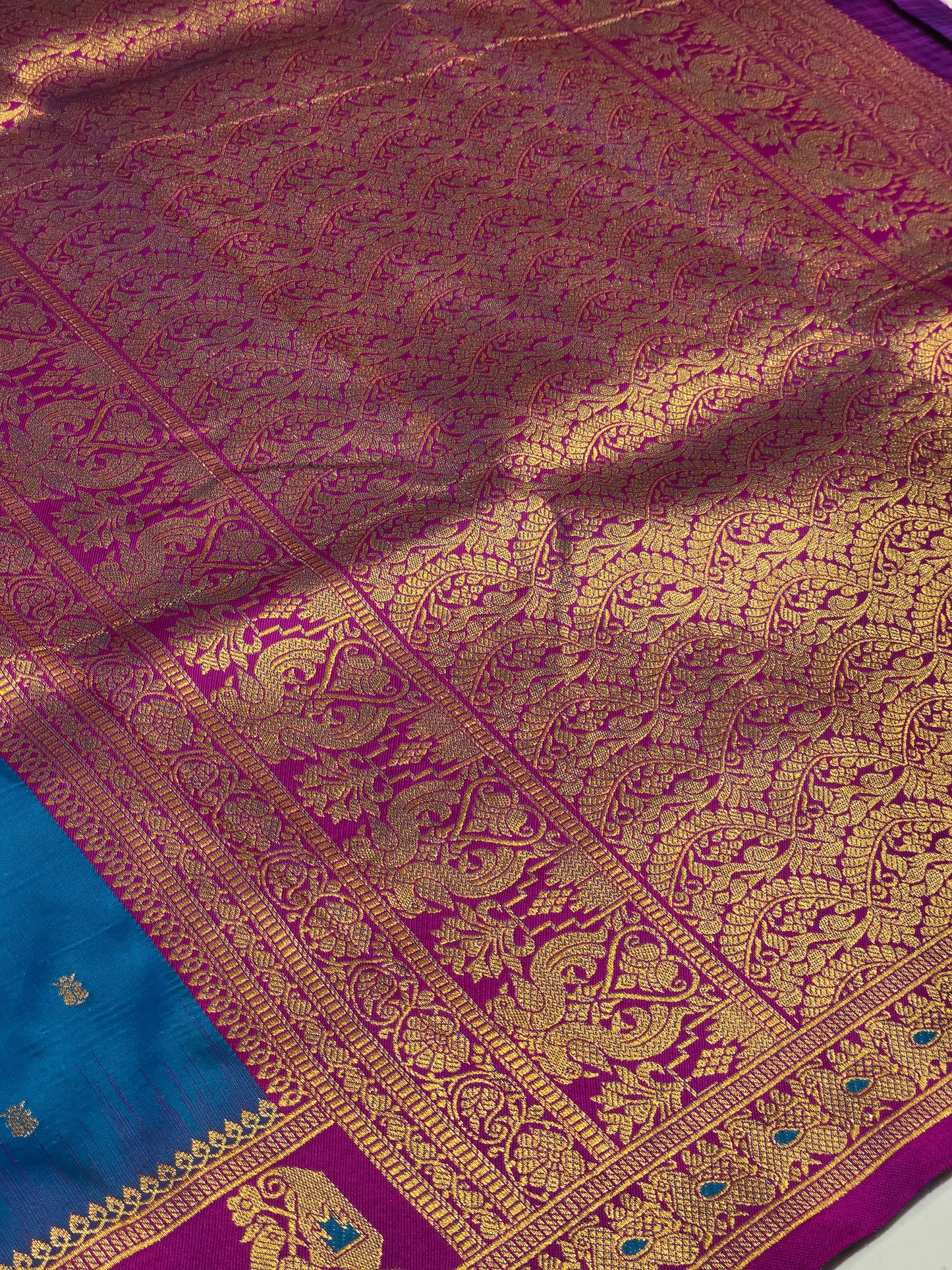 Semi soft silk with butta across the body rich pallu , traditional border