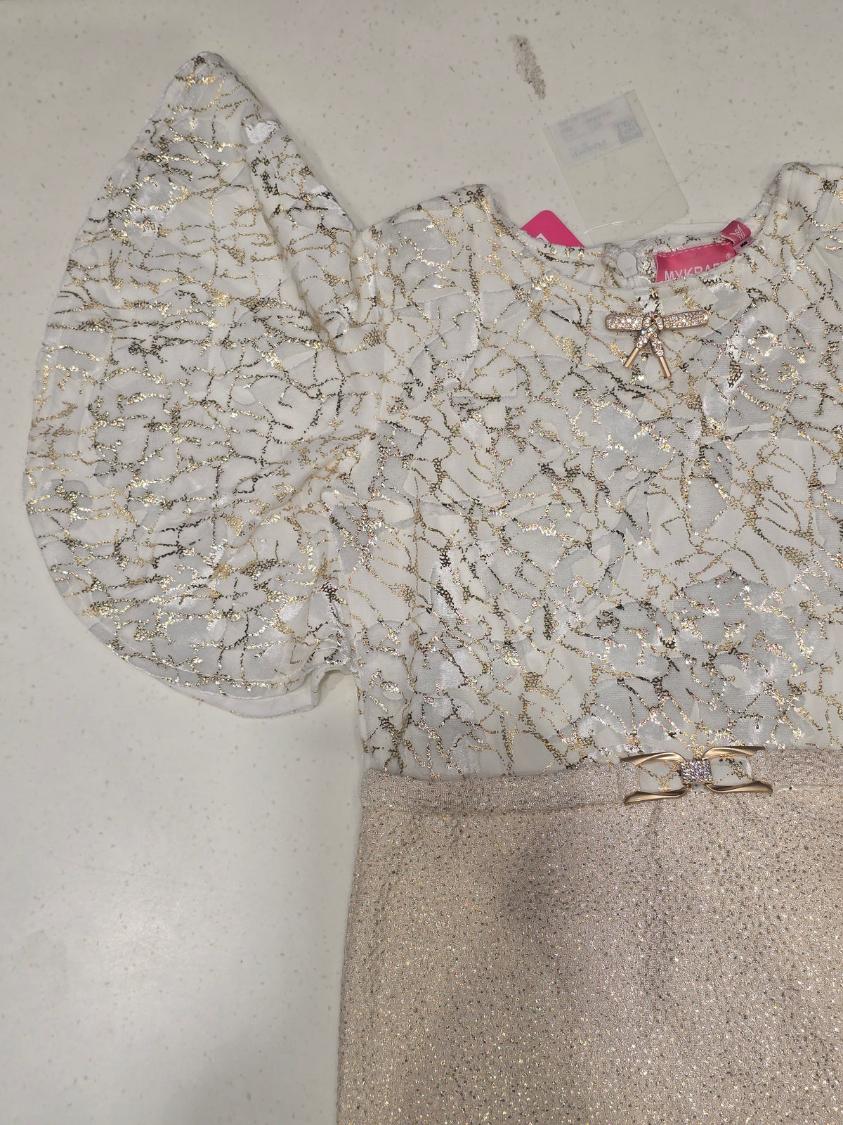 girls' party dress designed with a distinct two-toned look.