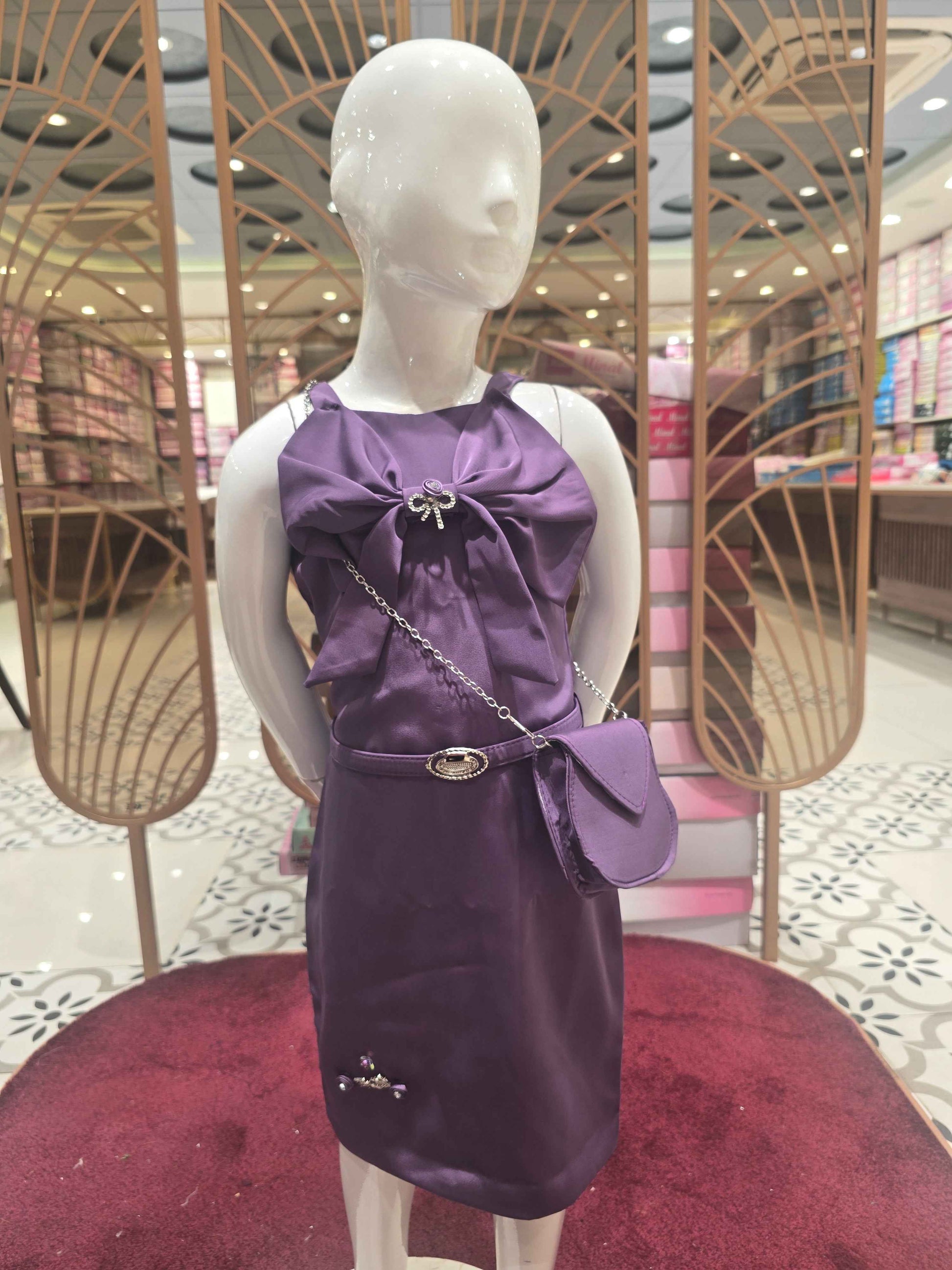 Satin material purple colour western bodycon with speghetti and bow styled design. An elegant smart bag