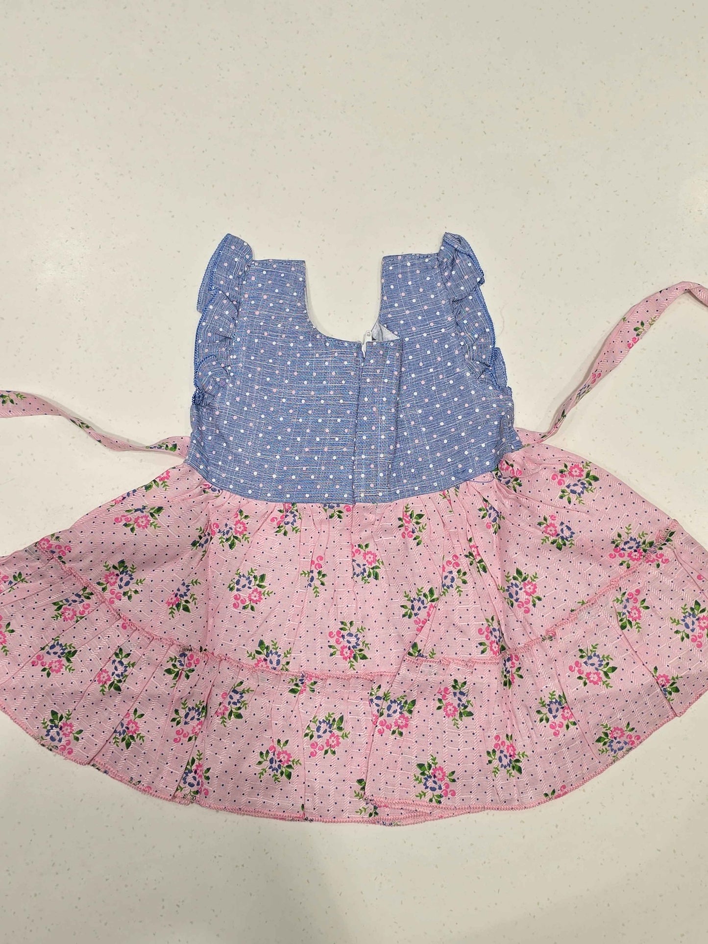 baby girl's cotton frock dress featuring a two-toned, paneled design