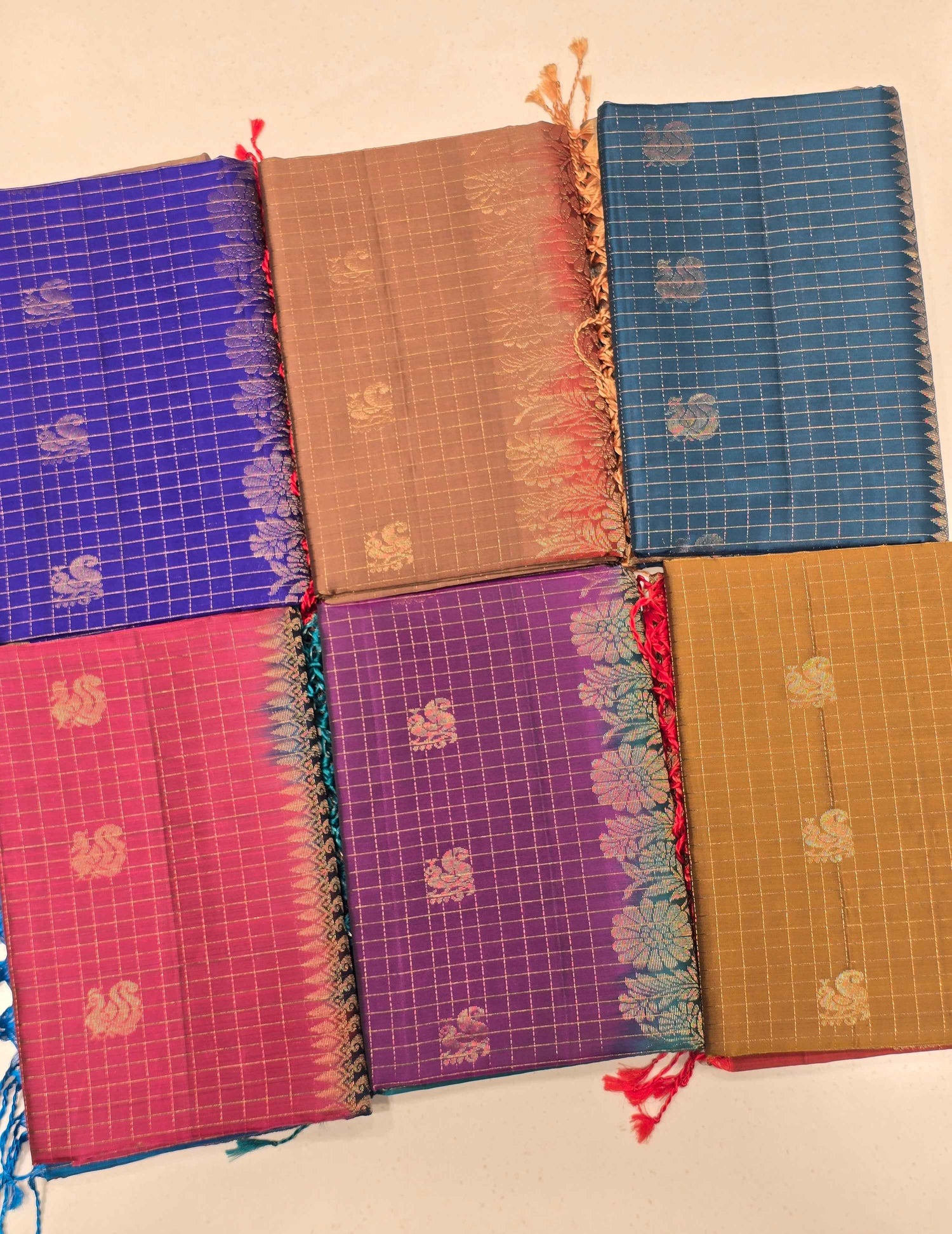 Pure softsilk saree , checked pattren with traditional peacock design motifs