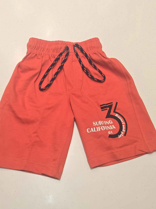 Pure cotton material orange coloured ¾ with prints and round Elasticable