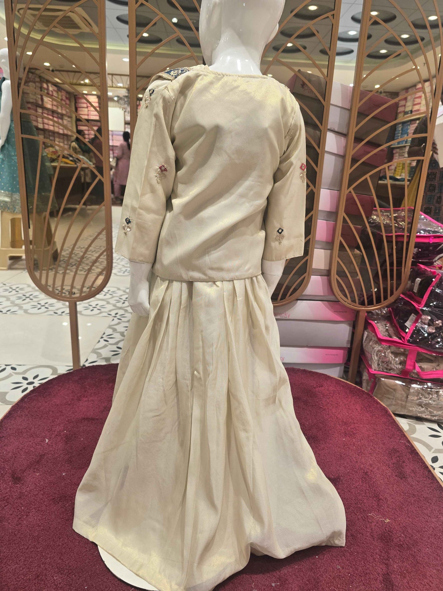 Shimmer material cream colour ethnic wear gaghra with multi colour embroidery, sequence & thread work with ladkans and jacket