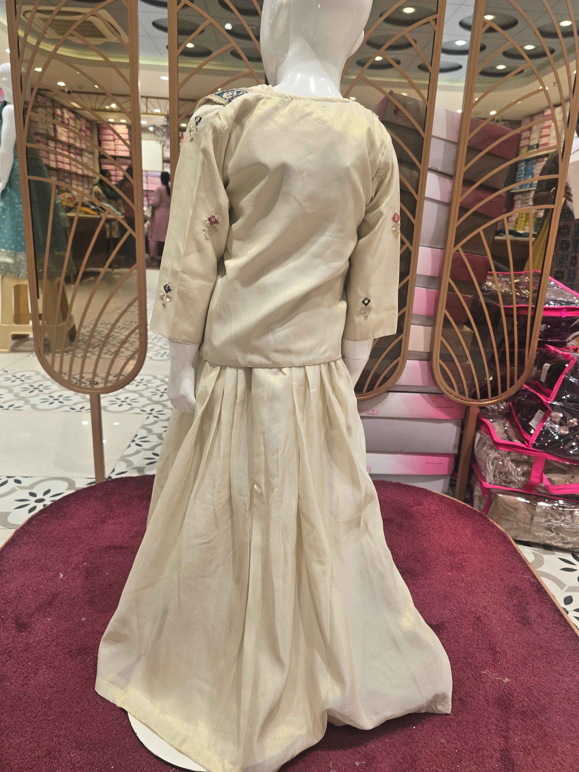 Shimmer material cream colour ethnic wear gaghra with multi colour embroidery, sequence & thread work with ladkans and jacket