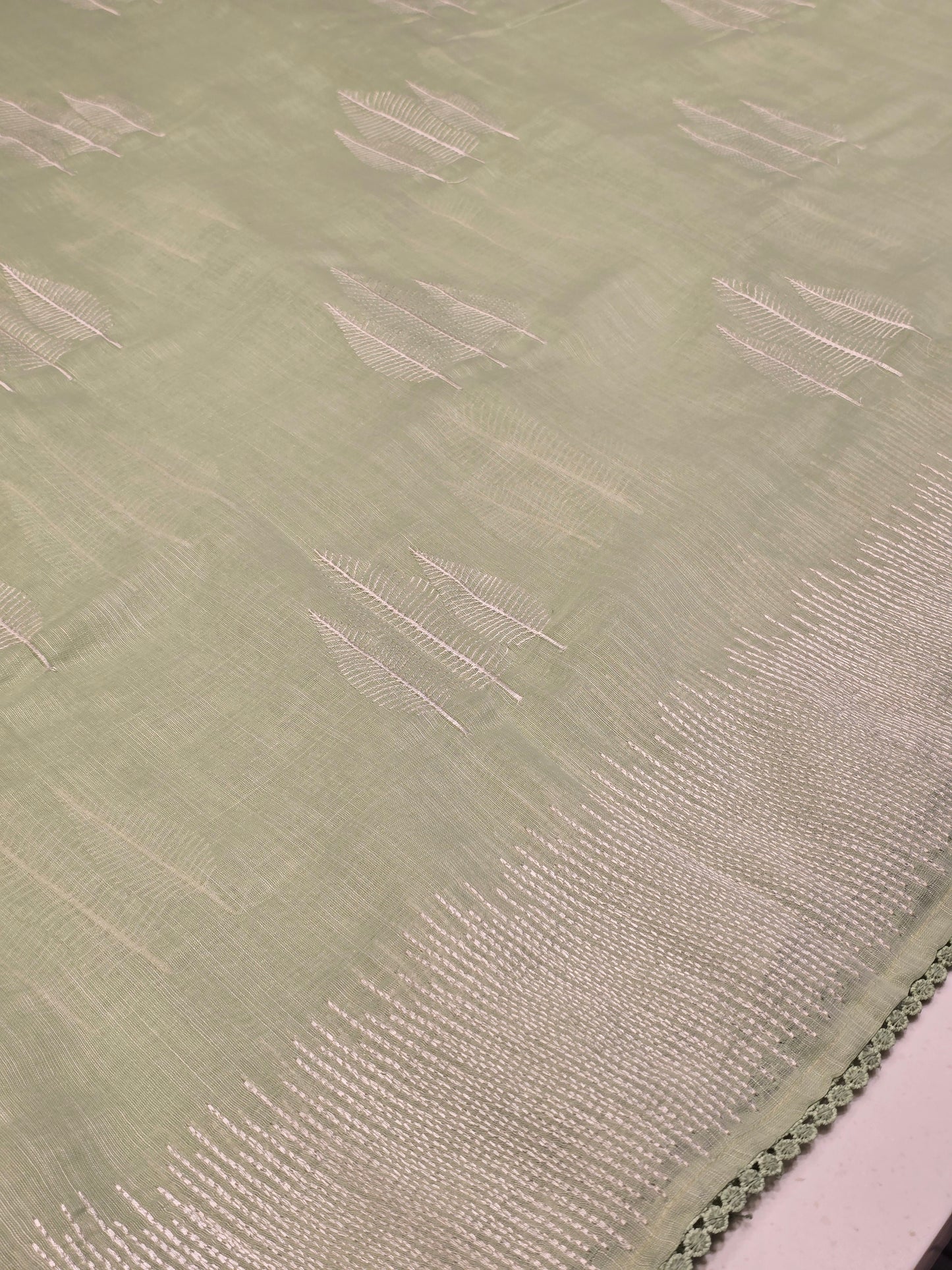 Linen with embroidery border and leaf motif Normal wear