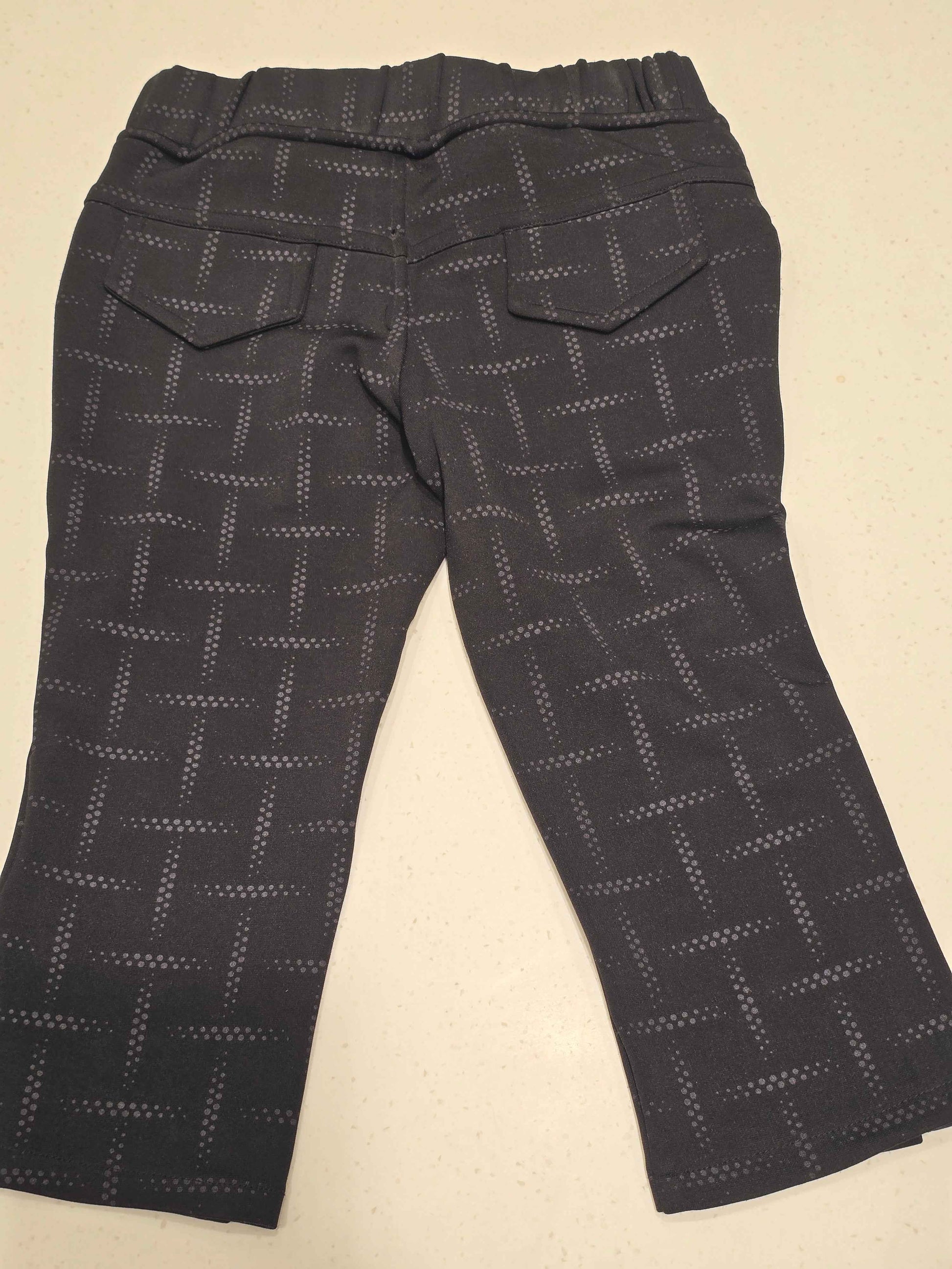Stretchable material black colour ¾ with checked pattren