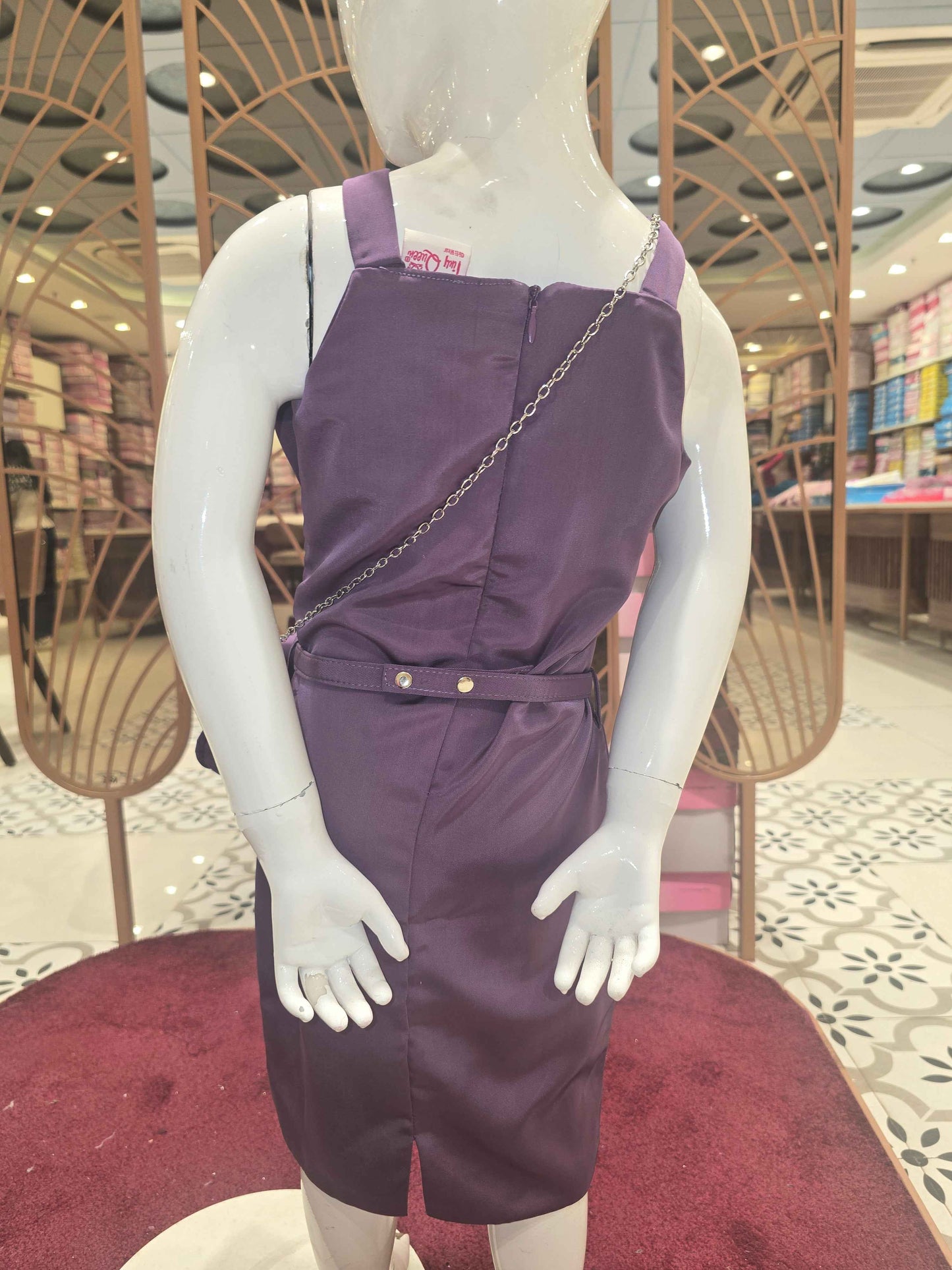 Satin material purple colour western bodycon with speghetti and bow styled design. An elegant smart bag
