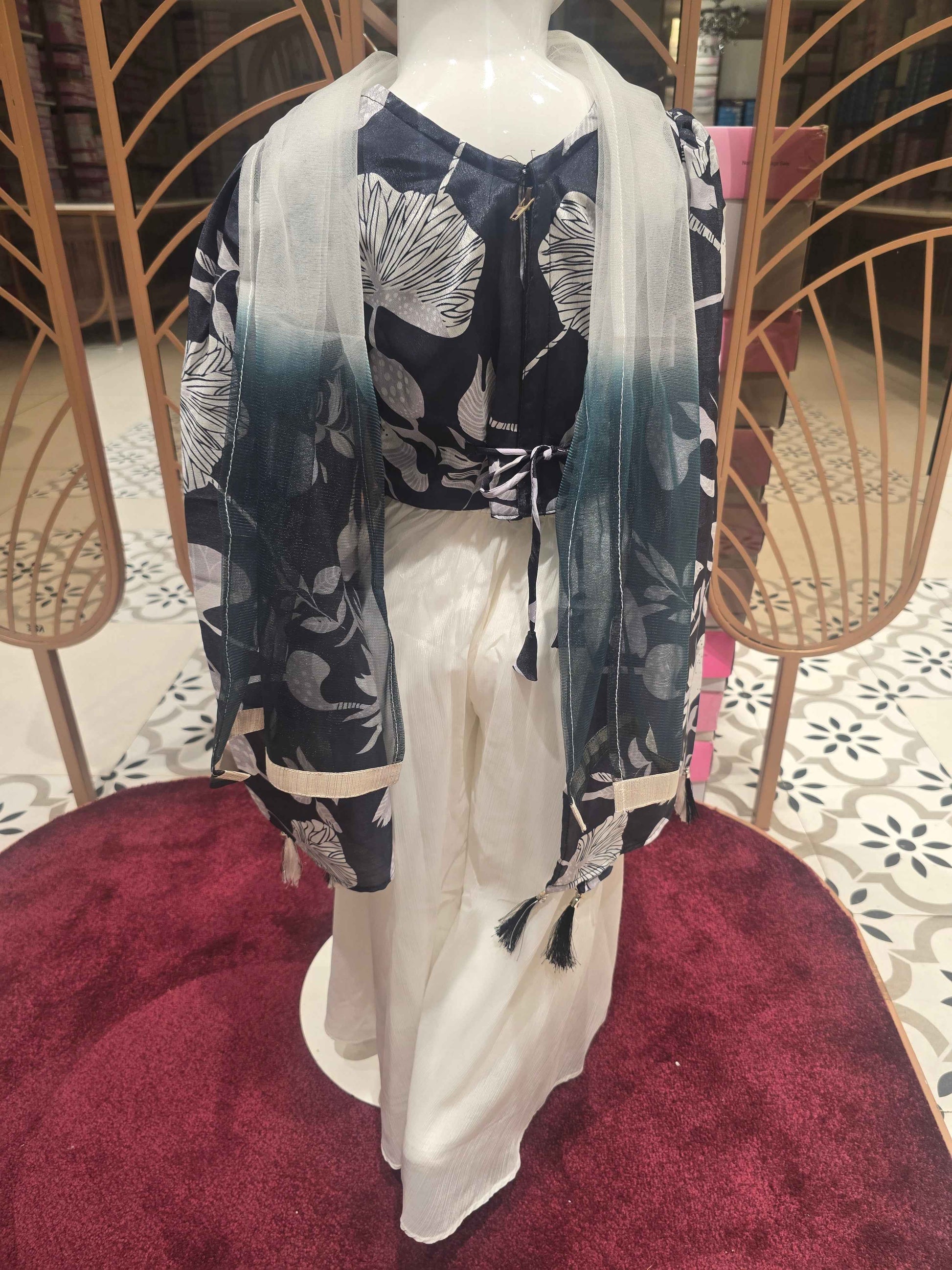 Crepe material black with halfwhite color party wear with bell sleeve