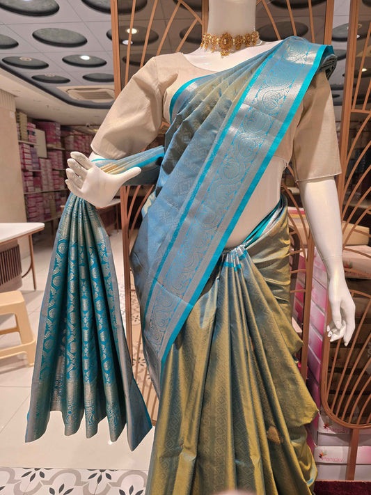 Semi tissue Kanjivaram saree with rich pallu and contrast blouse